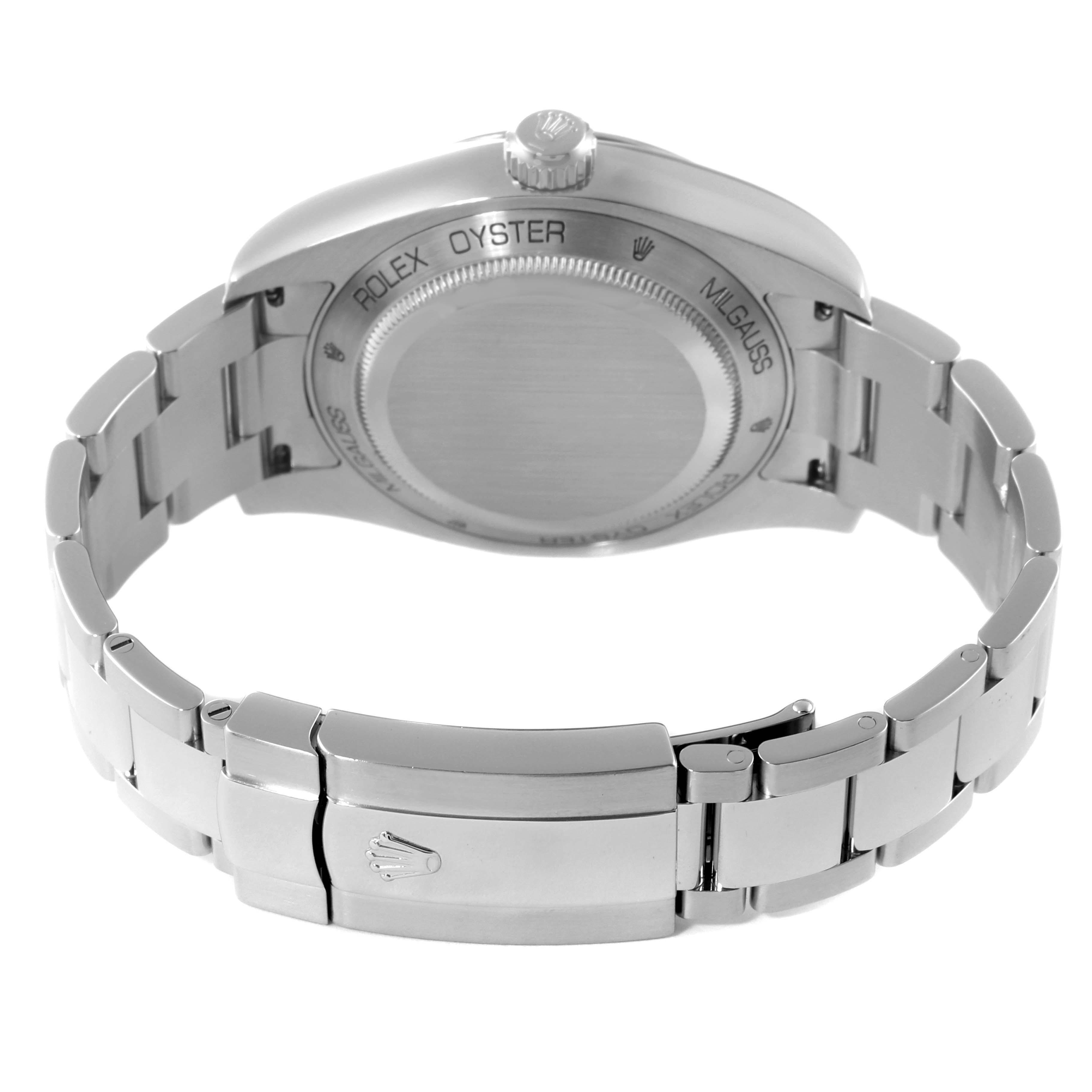 This image shows the rear case and bracelet of a Rolex Milgauss 116400GV Men's Stainless Steel Black Dial 116400GV Men's Stainless Steel Black Dial watch at a straight-on angle.