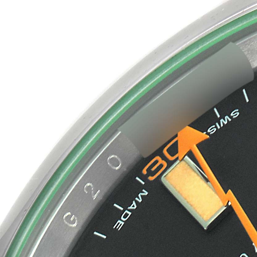 This close-up image shows the dial and orange lightning bolt-shaped second hand of the Rolex Milgauss 116400GV Men's Stainless Steel Black Dial 116400GV Men's Stainless Steel Black Dial watch.