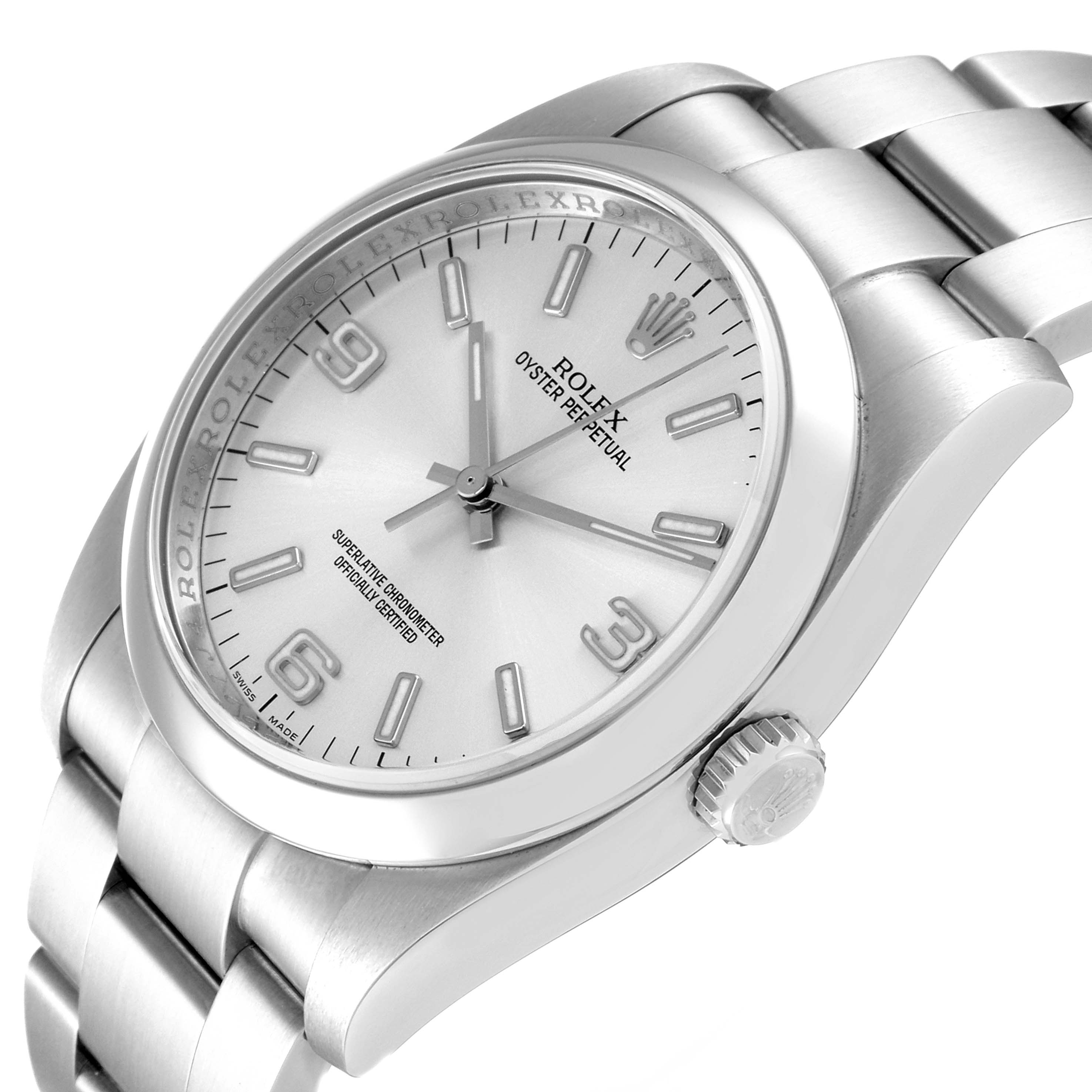 The image shows the Rolex Oyster Perpetual 116000 Men's Stainless Steel Silver Dial 116000 Men's Stainless Steel Silver Dial watch from an angled view, highlighting its face, case, crown, and bracelet.