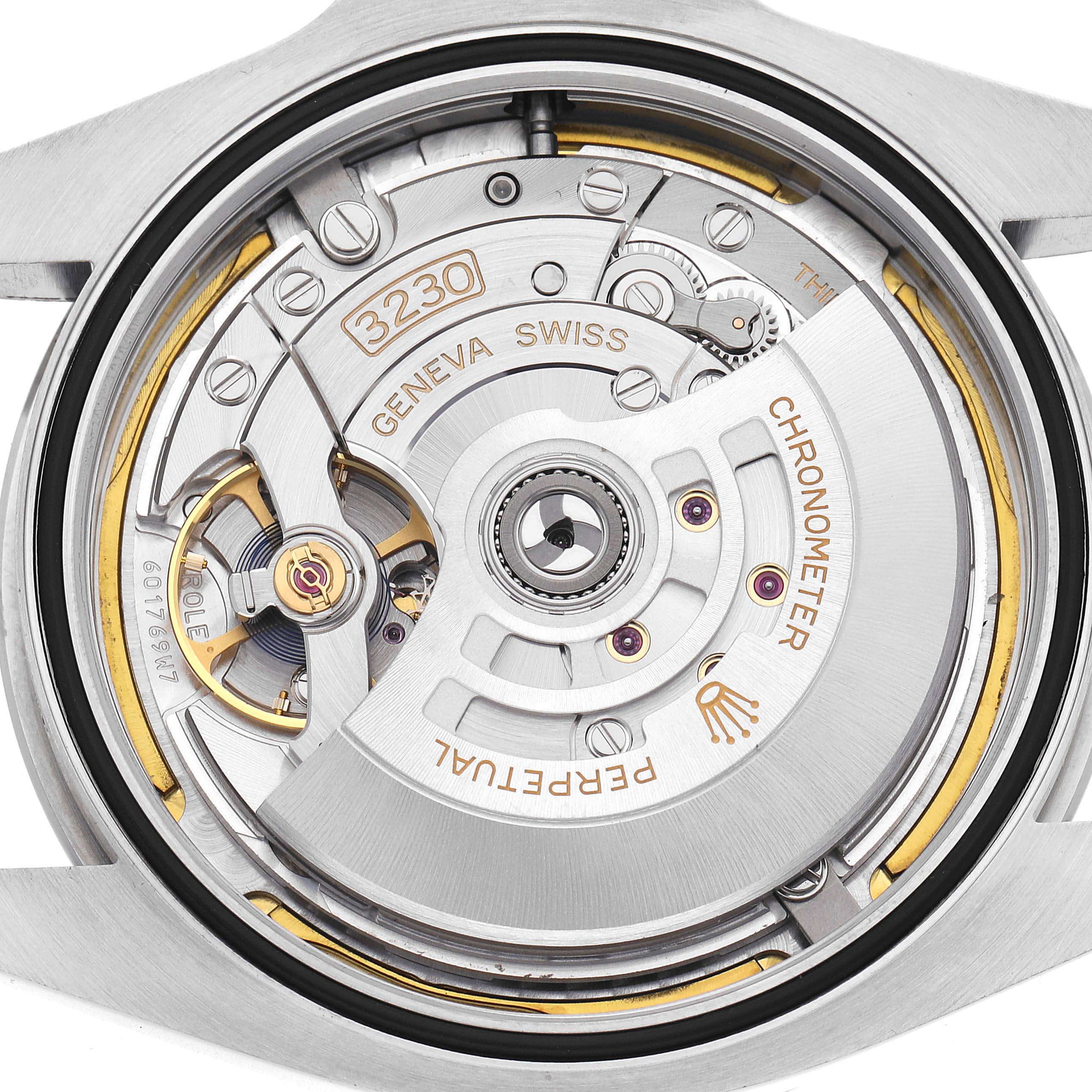 The image shows the back view of the Rolex Air-King 126900 Men's Stainless Steel Black Dial 126900 Men's Stainless Steel Black Dial, highlighting its movement and interior mechanisms.