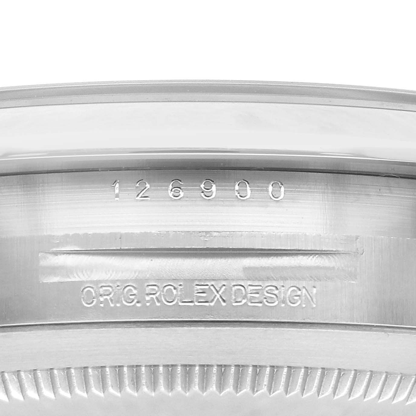 The image shows a close-up of the side engraving on the Rolex Air-King 126900 Men's Stainless Steel Black Dial 126900 Men's Stainless Steel Black Dial watch bezel, displaying the model number.