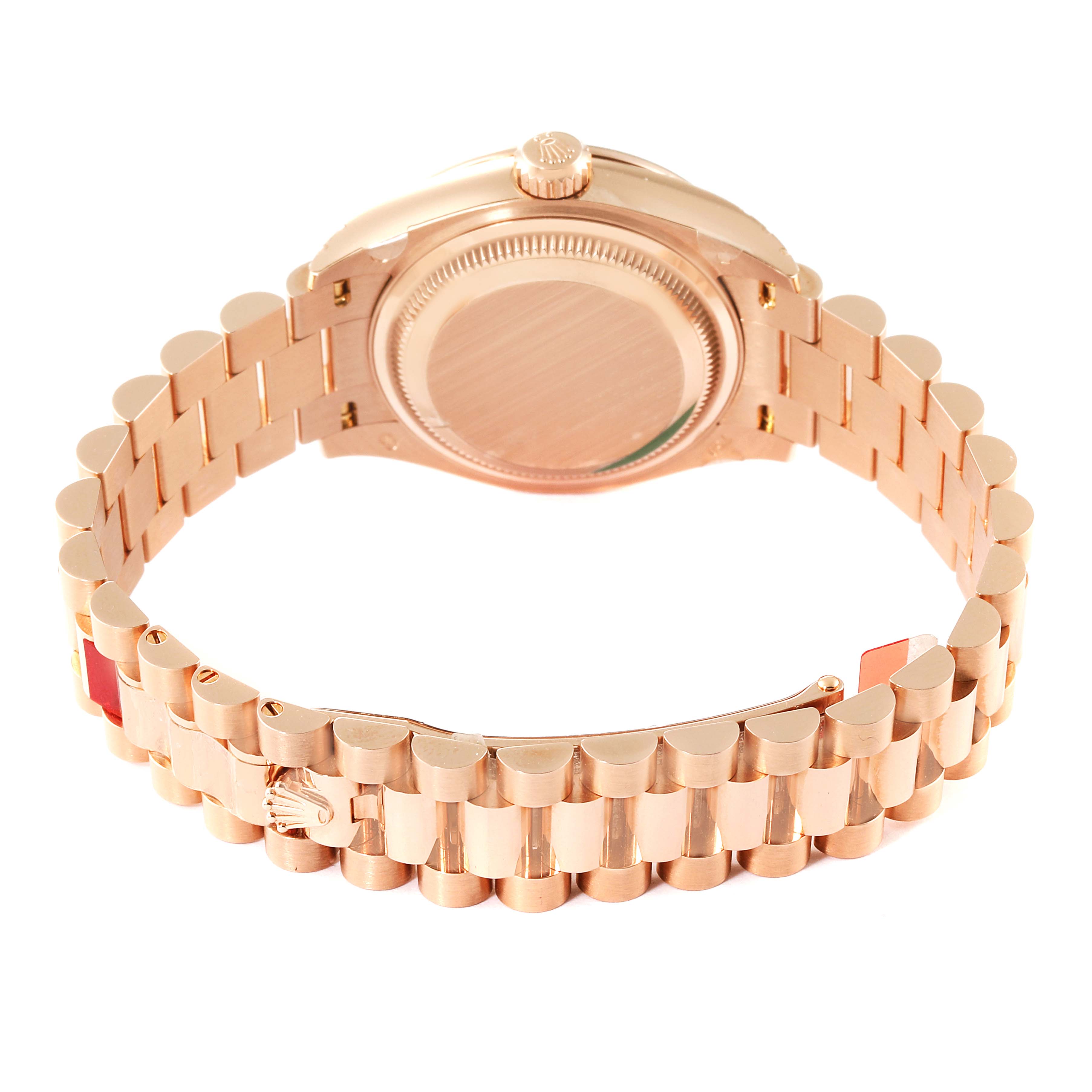 This image shows the back and bracelet of a Rolex President 279135 Women's Rose Gold Mother of Pearl Dial 279135 Women's Rose Gold Mother of Pearl Dial model watch, viewed from an underside angle.