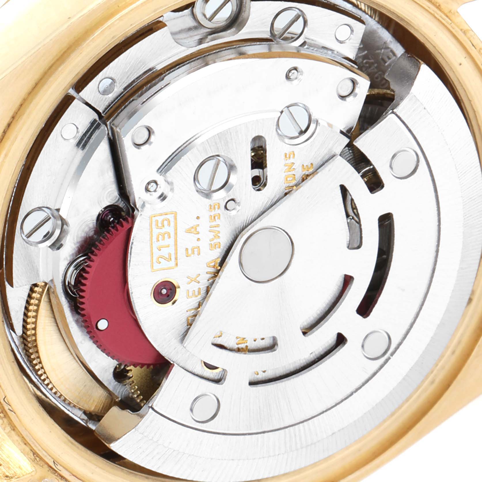 This close-up image shows the movement mechanism of a Rolex Datejust 69178 Women's Yellow Gold Champagne Dial 69178 Women's Yellow Gold Champagne Dial watch.
