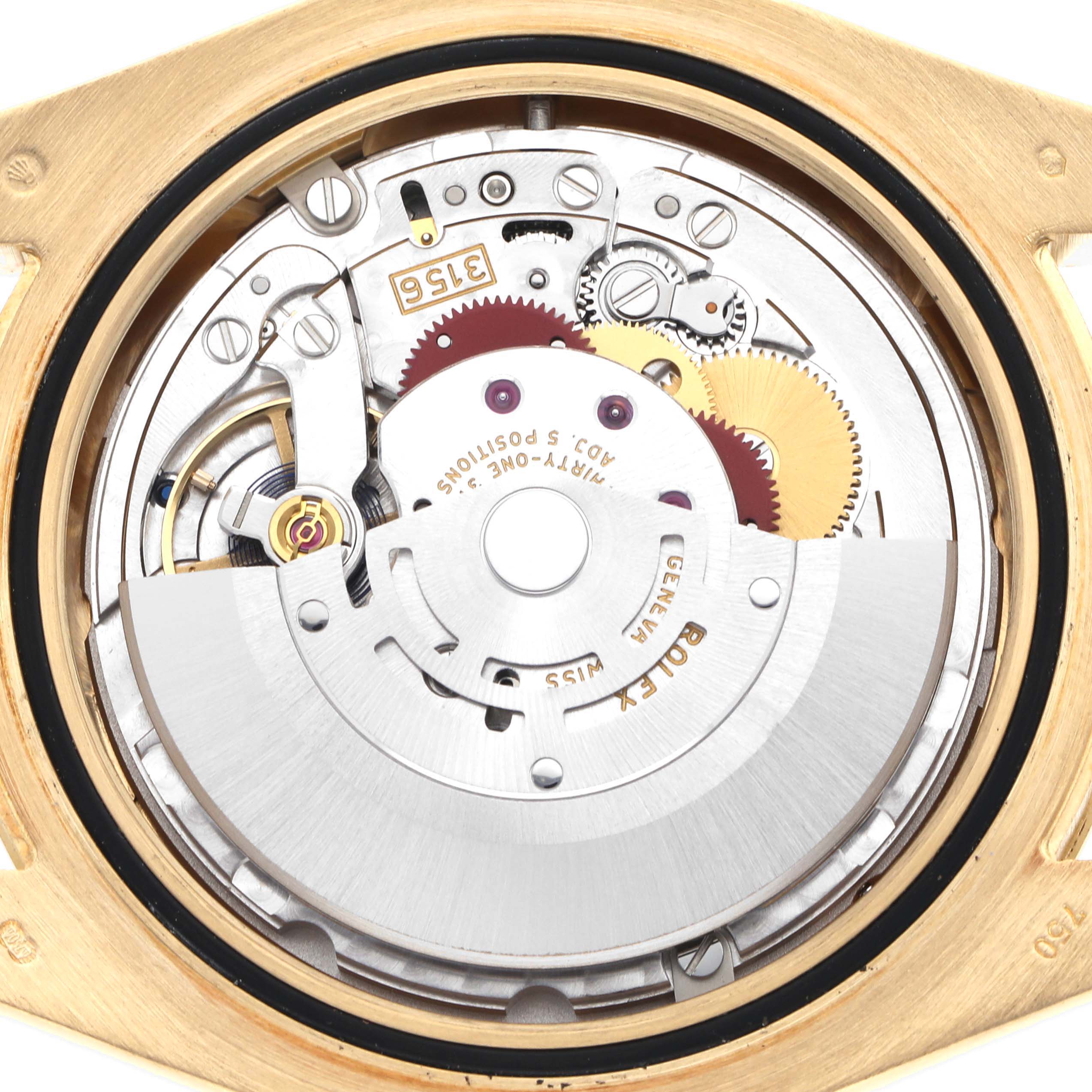 The image shows the intricate movement and rotor of a Rolex President 218238 Men
s Yellow Gold Champagne Dial 218238 Men
s Yellow Gold Champagne Dial model watch from a back view, highlighting its mechanical components.