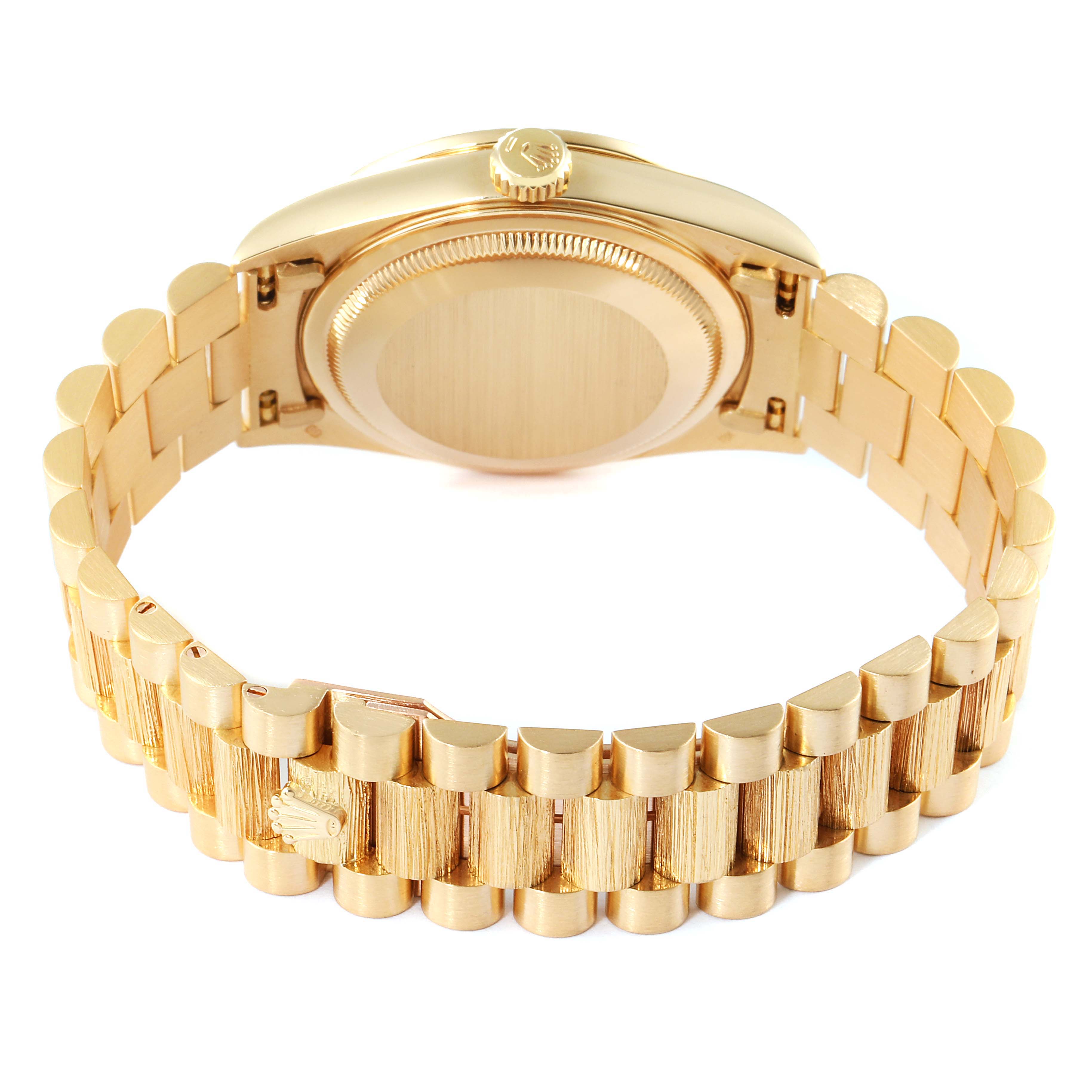 The image shows the back view of a Rolex President 18308 Men
s Yellow Gold White Dial 18308 Men
s Yellow Gold White Dial model watch, highlighting the case back and the gold bracelet.
