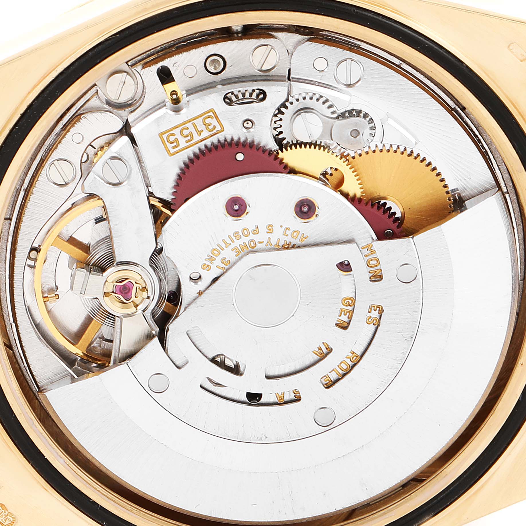 This image shows an internal view of the mechanical movement of a Rolex President 18308 Men
s Yellow Gold White Dial 18308 Men
s Yellow Gold White Dial model watch, highlighting gears and components.