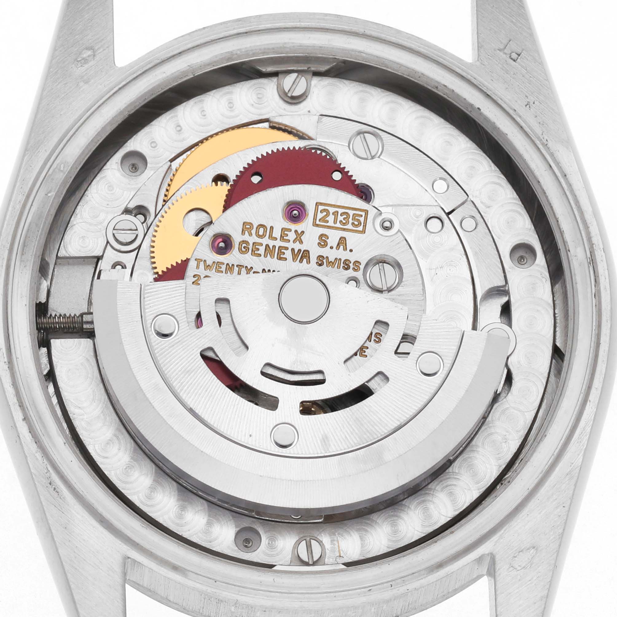The image shows the movement from the back of a Rolex Mid-Size 68246 Women
s Platinum Silver Dial 68246 Women
s Platinum Silver Dial watch, highlighting gears and the rotor.