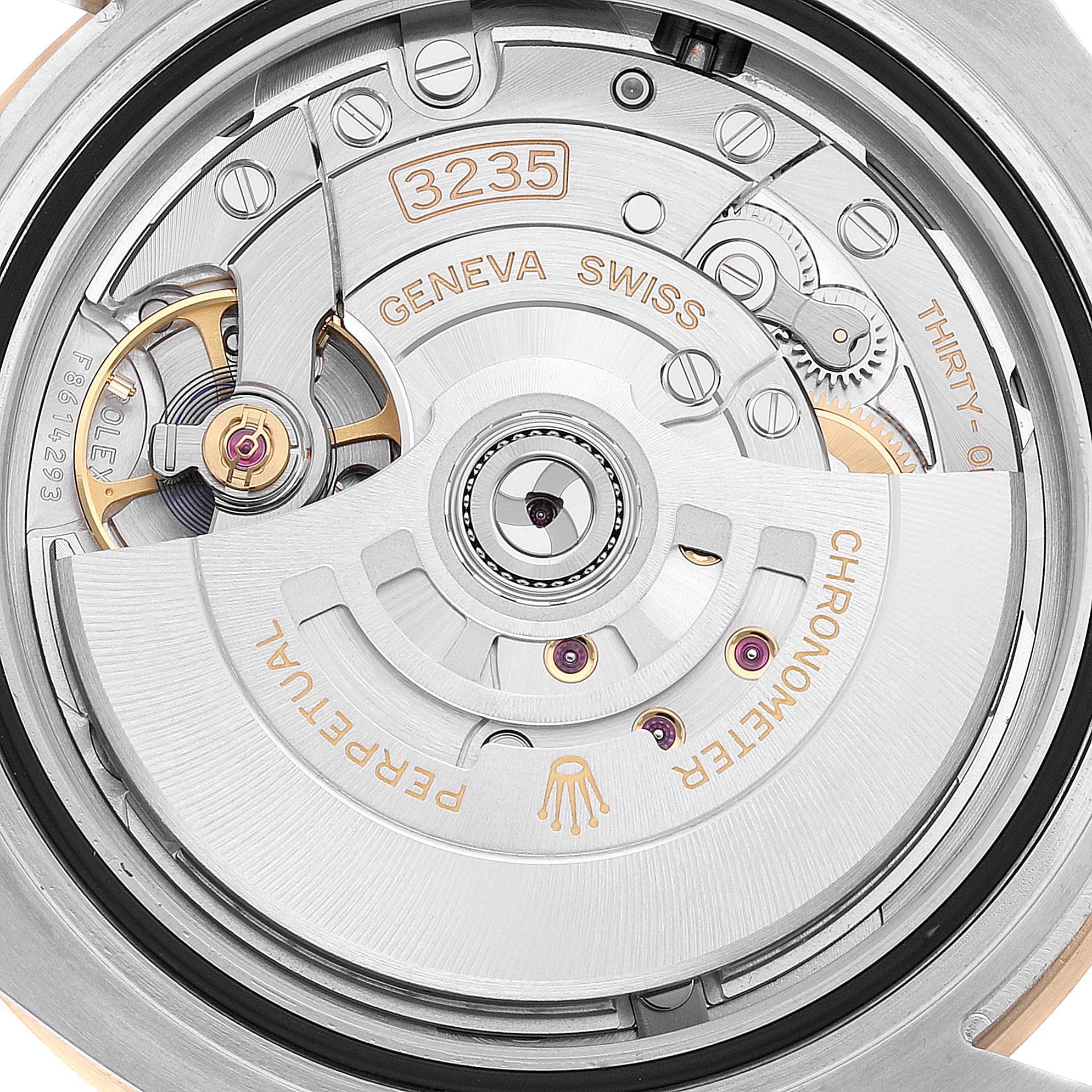 This image shows the movement mechanism of a Rolex Submariner 126613 Men's Steel and Gold (two tone) Blue Dial 126613 Men's Steel and Gold (two tone) Blue Dial watch, detailing the intricate design of the 3235 caliber.