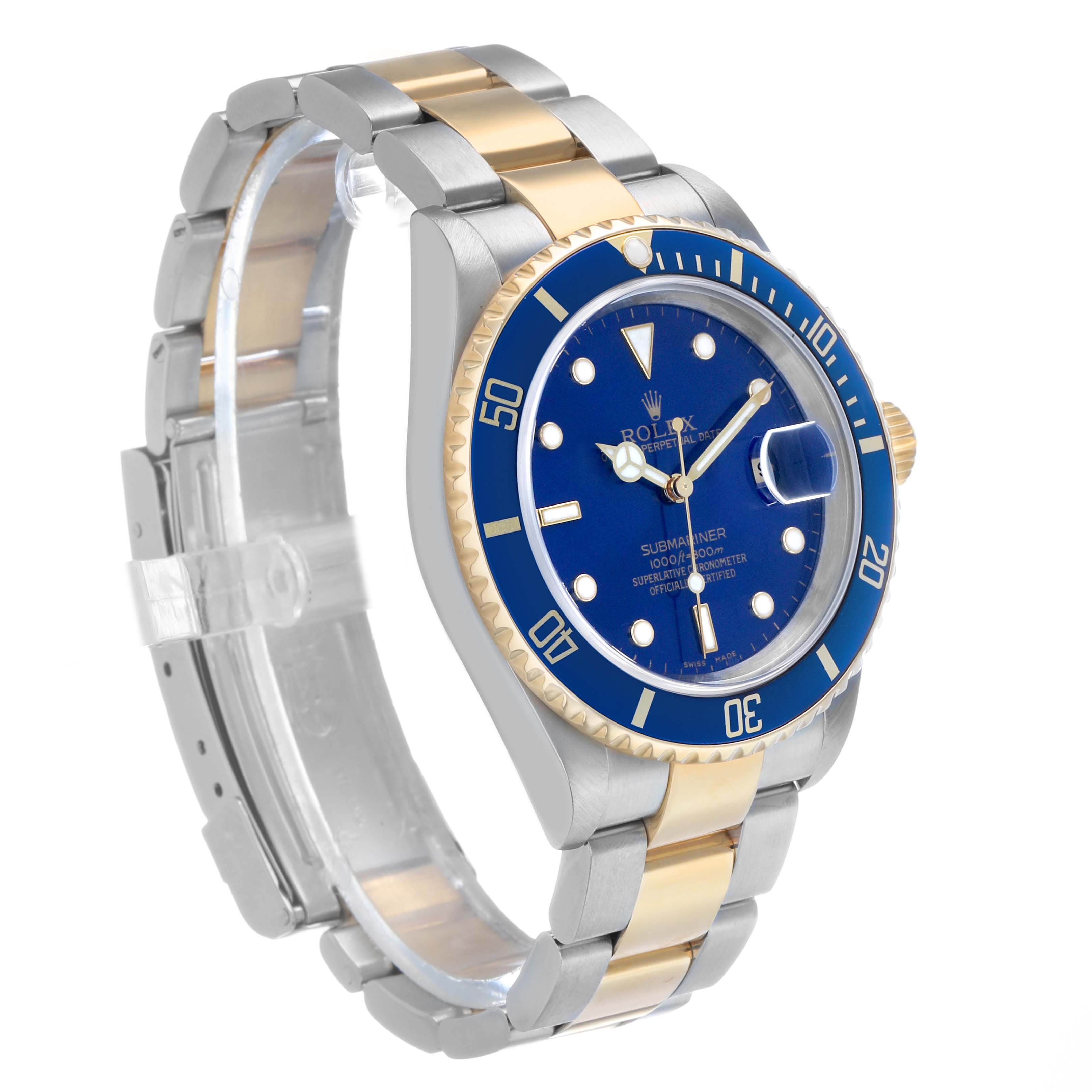 The Rolex Submariner 16613 Men's Steel and Gold (two tone) Blue Dial watch is shown from a three-quarter angle, highlighting its blue bezel, dial, and two-tone bracelet.