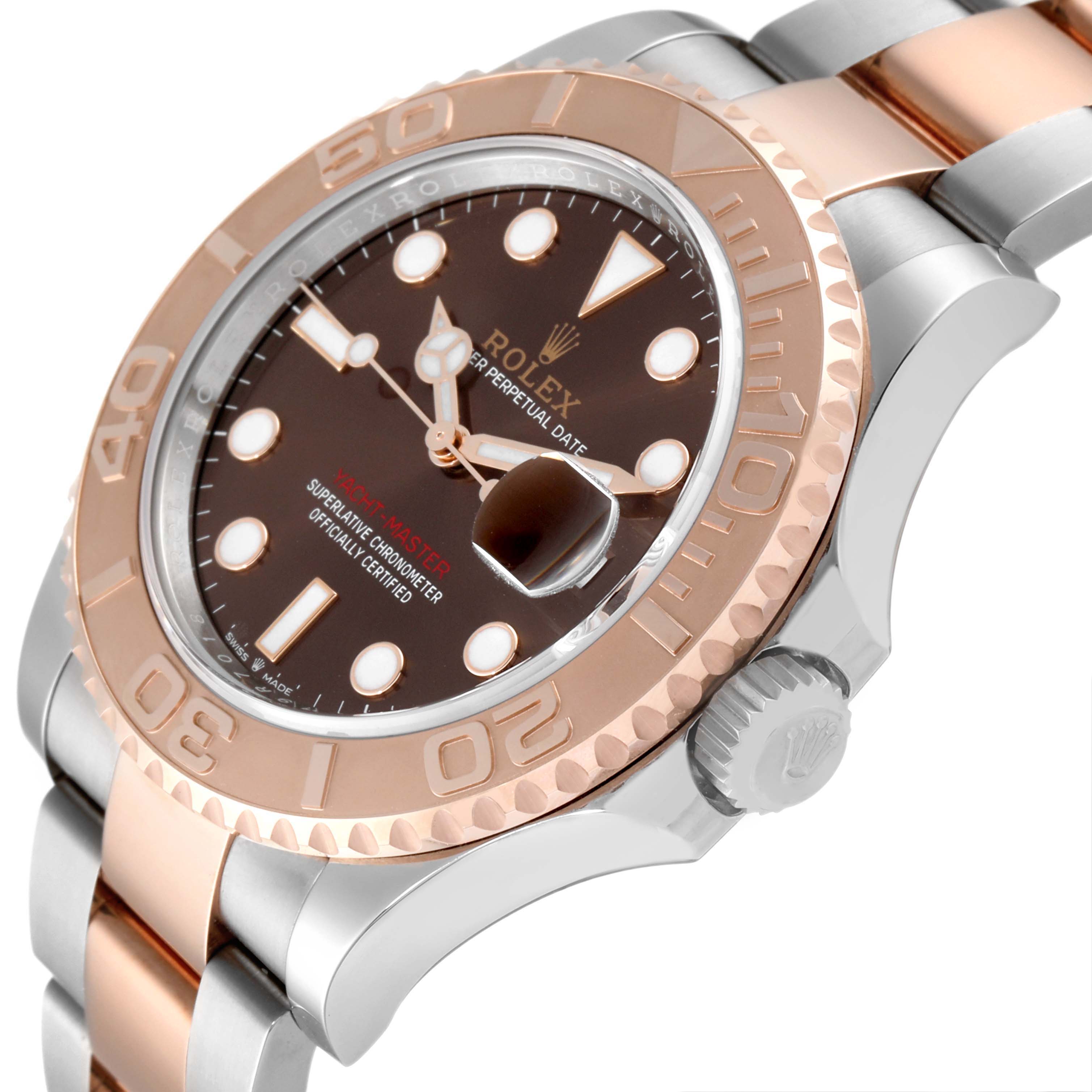The image shows a Rolex Yacht-Master 126621 Men's Steel and Gold (two tone) Brown Dial 126621 Men's Steel and Gold (two tone) Brown Dial watch from a slight side angle, highlighting its bezel, crown, and bracelet.