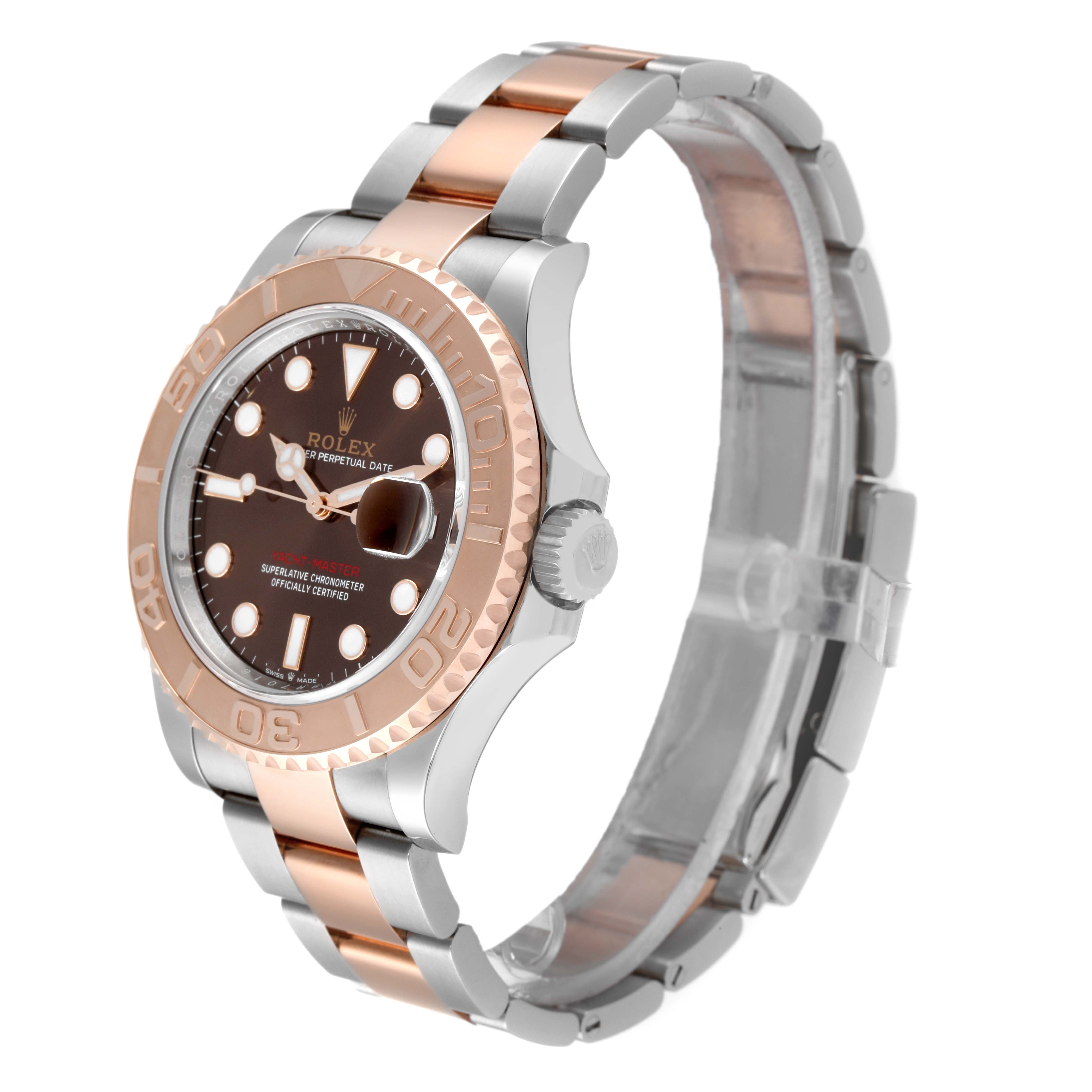 The image shows a side angle view of a Rolex Yacht-Master 126621 Men's Steel and Gold (two tone) Brown Dial 126621 Men's Steel and Gold (two tone) Brown Dial watch highlighting its two-tone metal bracelet and face.