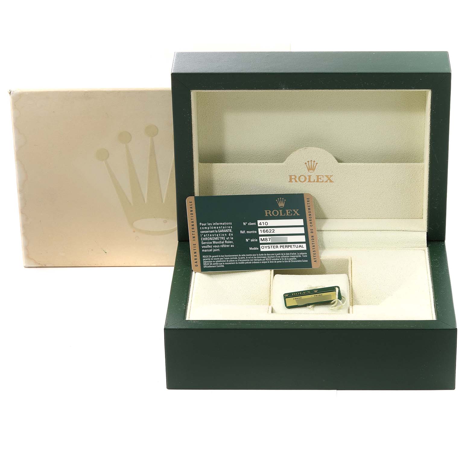 The image shows an open Rolex Yacht-Master 16622 Men
s Stainless Steel Silver Dial 16622 Men
s Stainless Steel Silver Dial watch box with a warranty card and a Rolex branded tag inside.