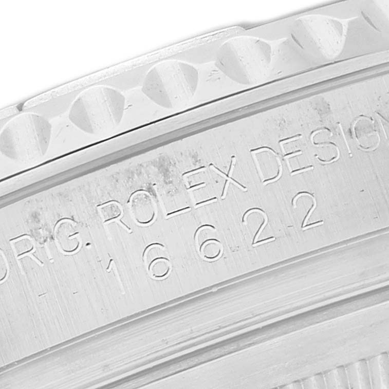 Close-up of the bezel and engraved serial number part of a Rolex Yacht-Master 16622 Men
s Stainless Steel Silver Dial 16622 Men
s Stainless Steel Silver Dial watch.