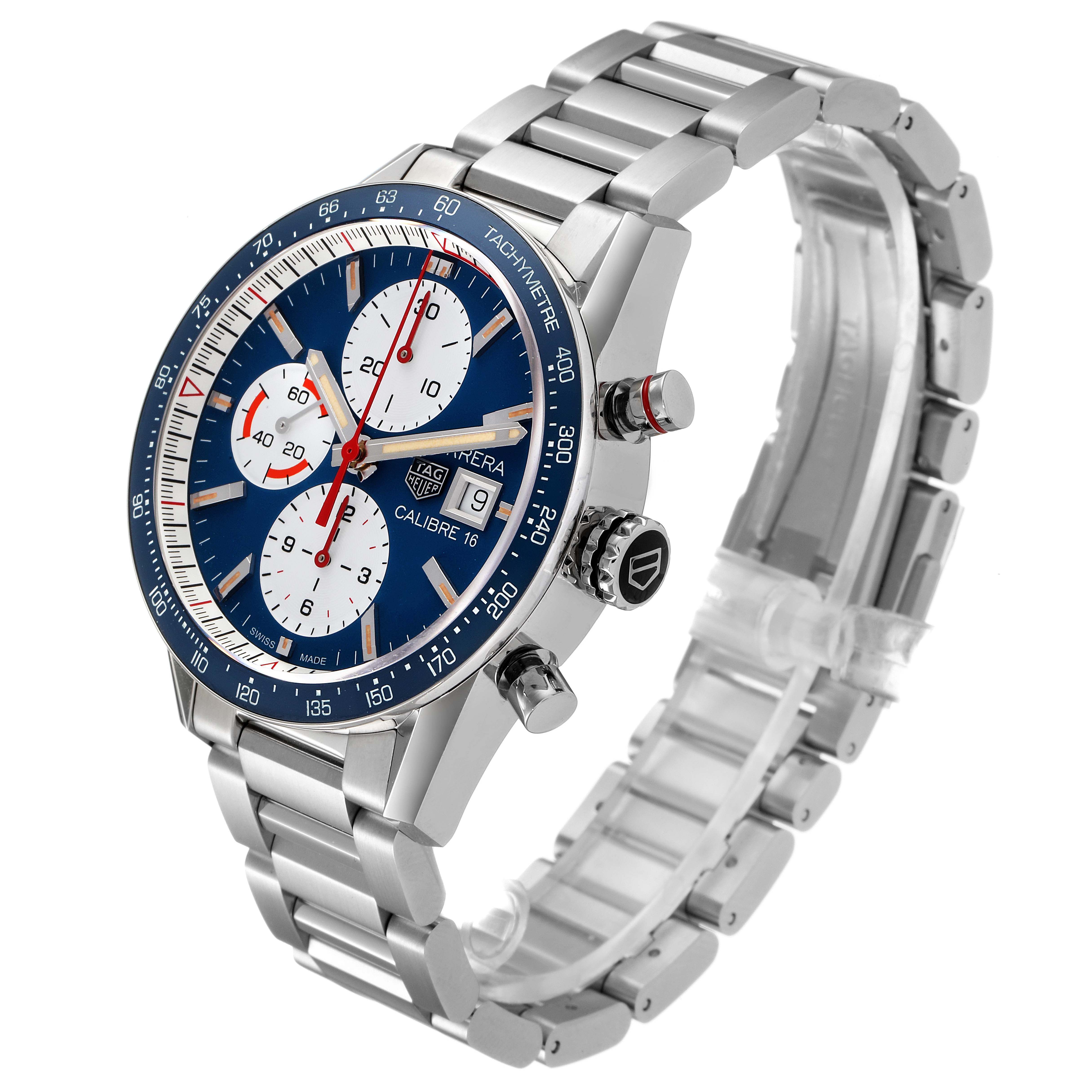 The image shows a Tag Heuer Carrera CV201AR.BA0715 Men's Stainless Steel Blue Dial CV201AR.BA0715 Men's Stainless Steel Blue Dial watch at an angled side view, highlighting its dial, chronograph buttons, and metal bracelet.