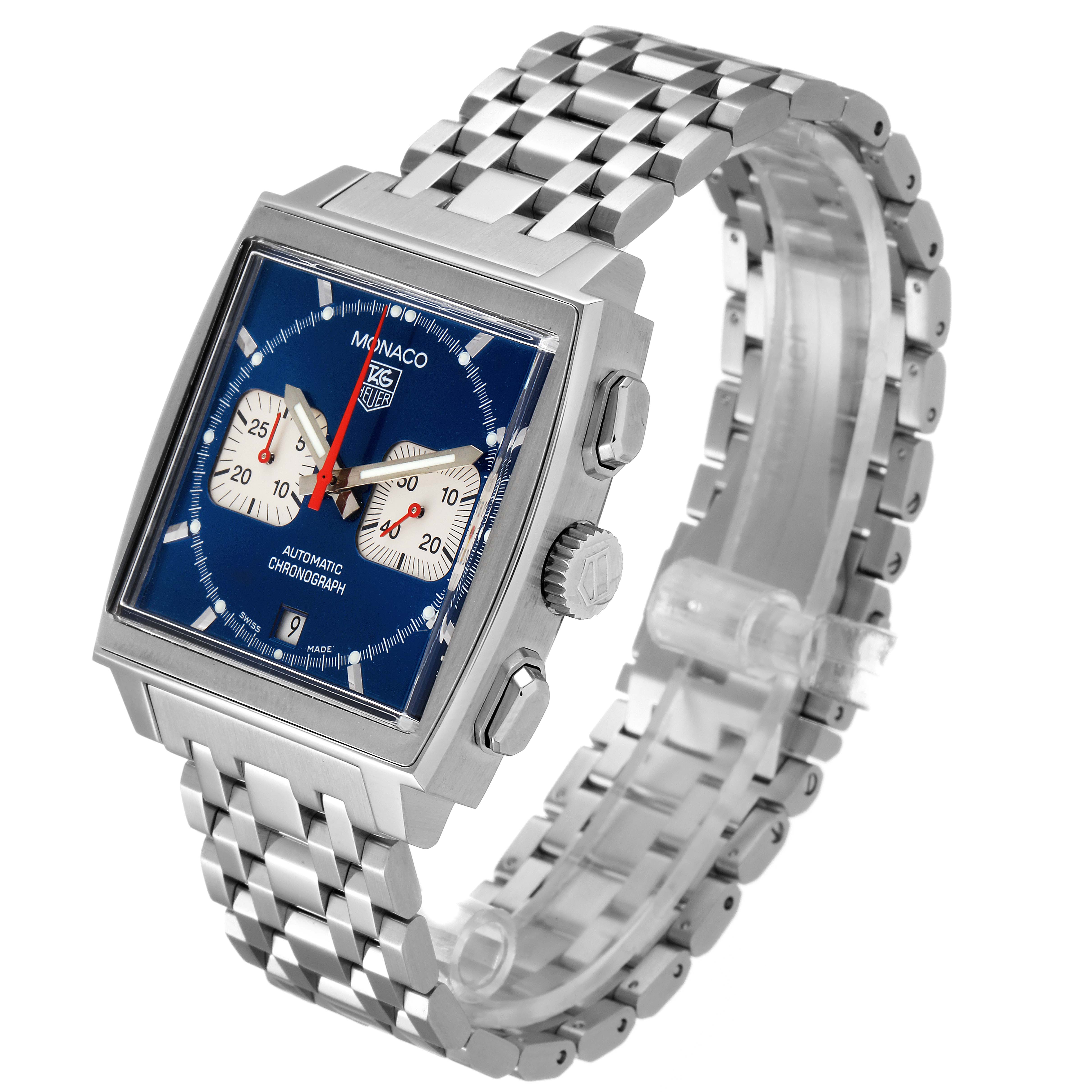 The image shows a Tag Heuer Monaco CW2113.BA0780 Men
s Stainless Steel Blue Dial CW2113.BA0780 Men
s Stainless Steel Blue Dial watch angled to display the face, bezel, crown, pushers, and metal bracelet.