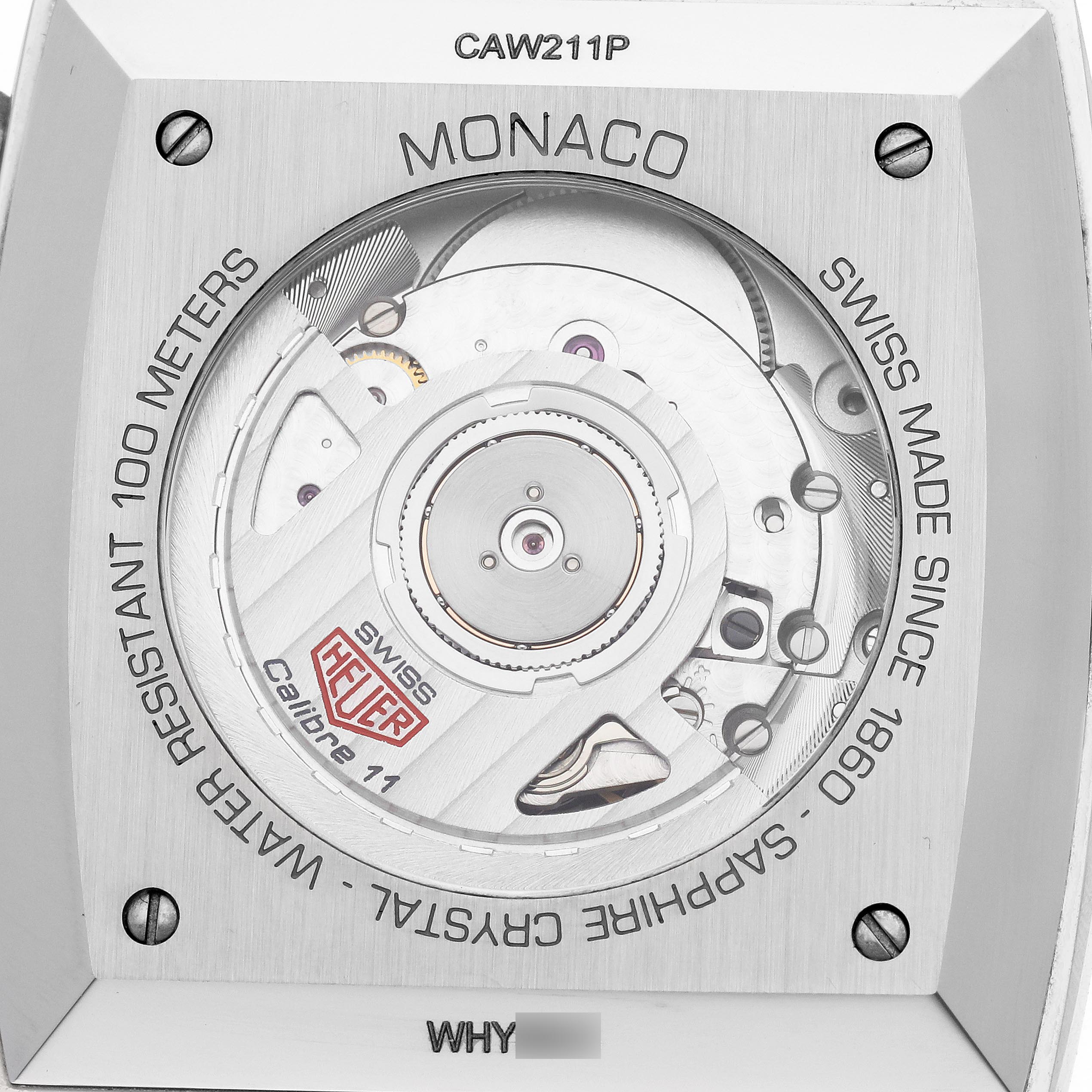 The image shows the back view of a Tag Heuer Monaco CAW211P.FC6356 Men
s Stainless Steel Blue Dial CAW211P.FC6356 Men
s Stainless Steel Blue Dial watch, highlighting the Calibre 11 movement and inscriptions.