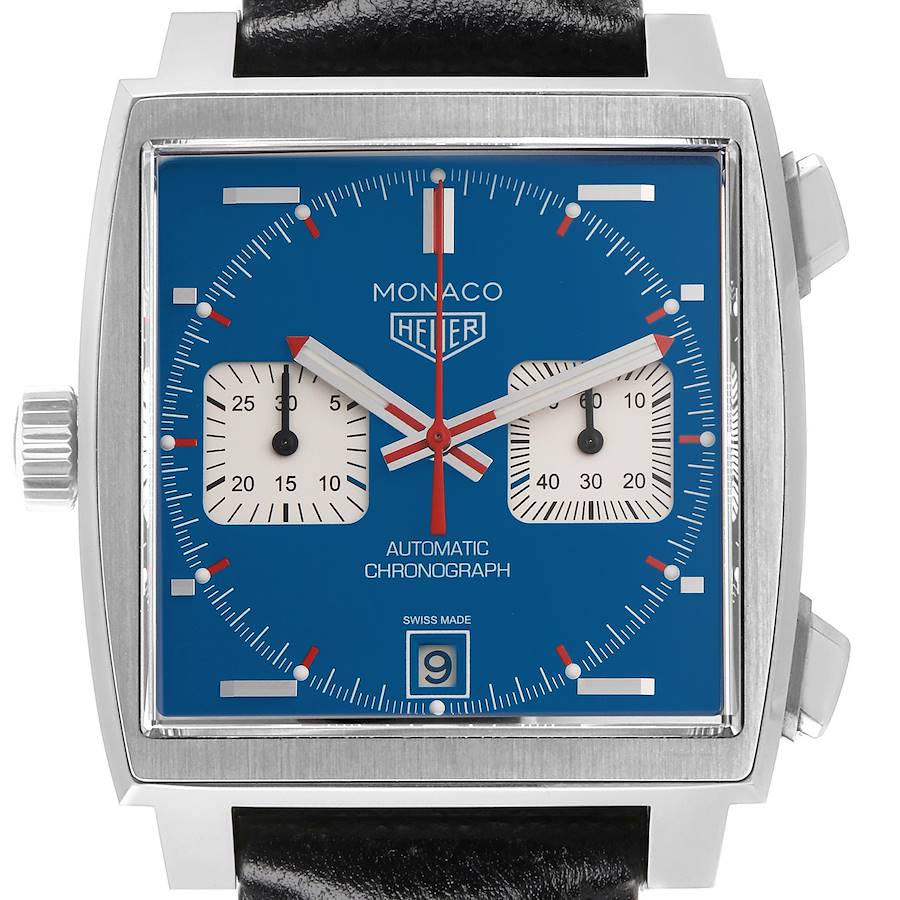 The image shows a front view of the Tag Heuer Monaco watch, highlighting its square case, blue dial, and subdials.