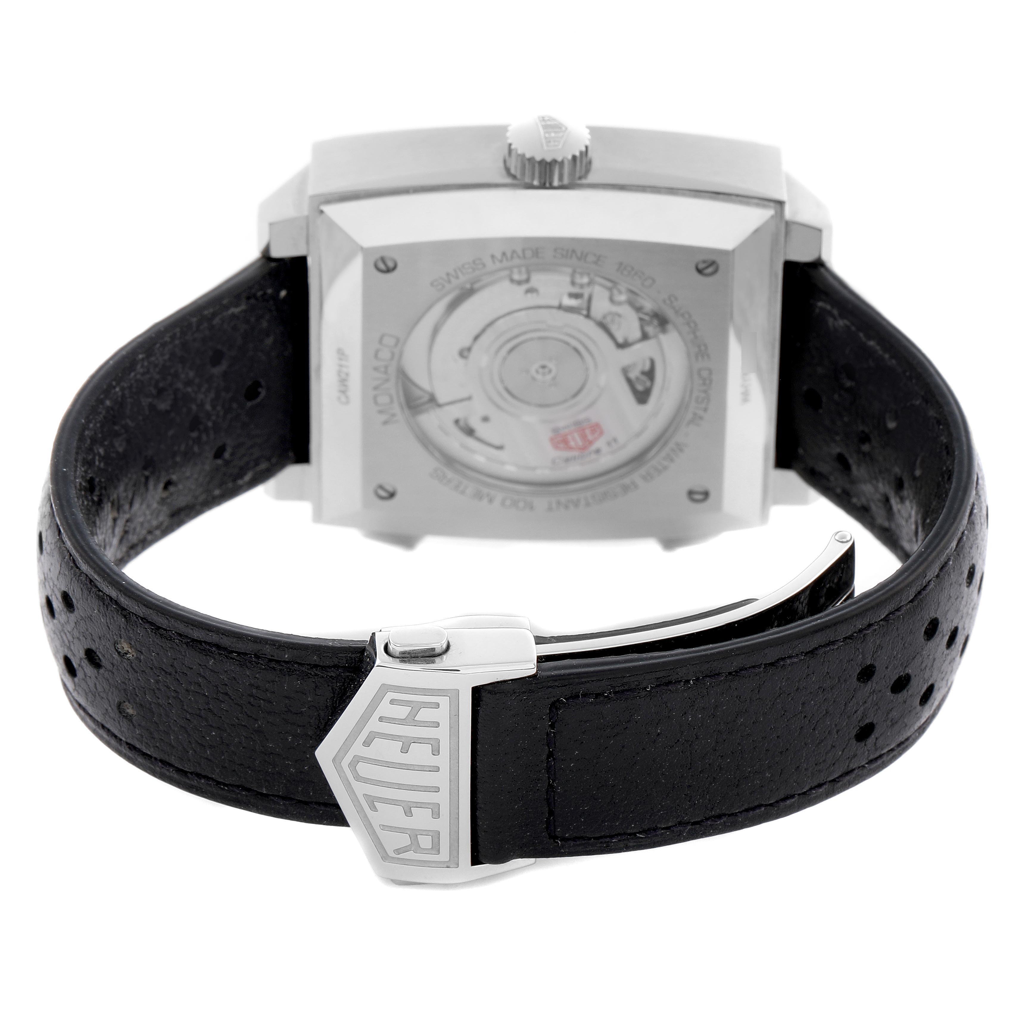 The image shows the back view of the Tag Heuer Monaco CAW211P.FC6356 Men
s Stainless Steel Blue Dial CAW211P.FC6356 Men
s Stainless Steel Blue Dial watch, highlighting the movement and buckle.