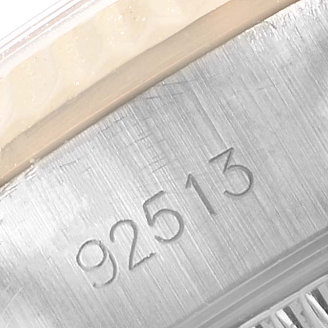 This close-up shows the model number engraving on the side of the bezel for the Tudor Princess 92513 Women's Steel and Gold (two tone) Silver Dial 92513 Women's Steel and Gold (two tone) Silver Dial watch.