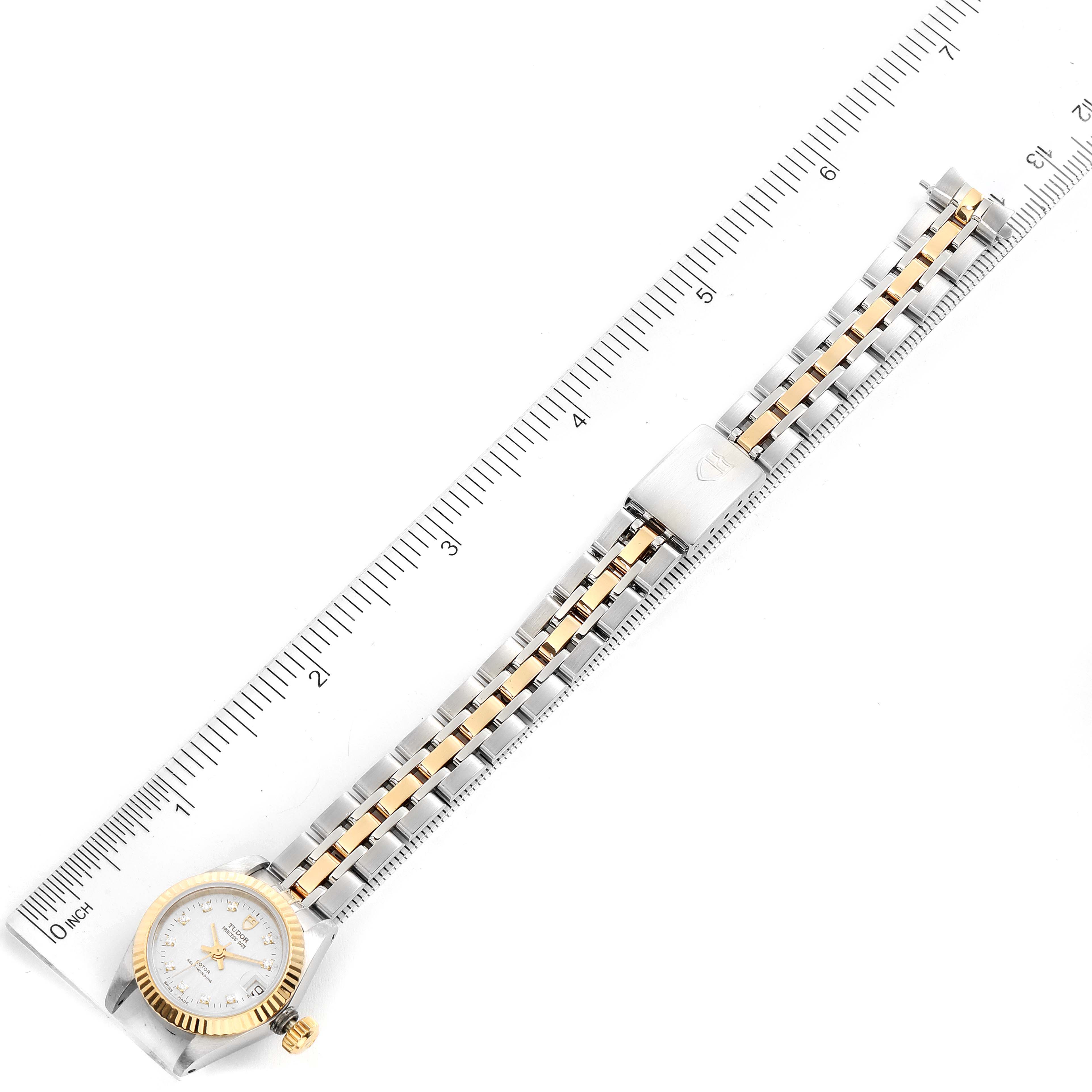 The image shows an overhead view of a Tudor Princess 92513 Women's Steel and Gold (two tone) Silver Dial 92513 Women's Steel and Gold (two tone) Silver Dial watch, displaying the full bracelet and ruler for size reference.