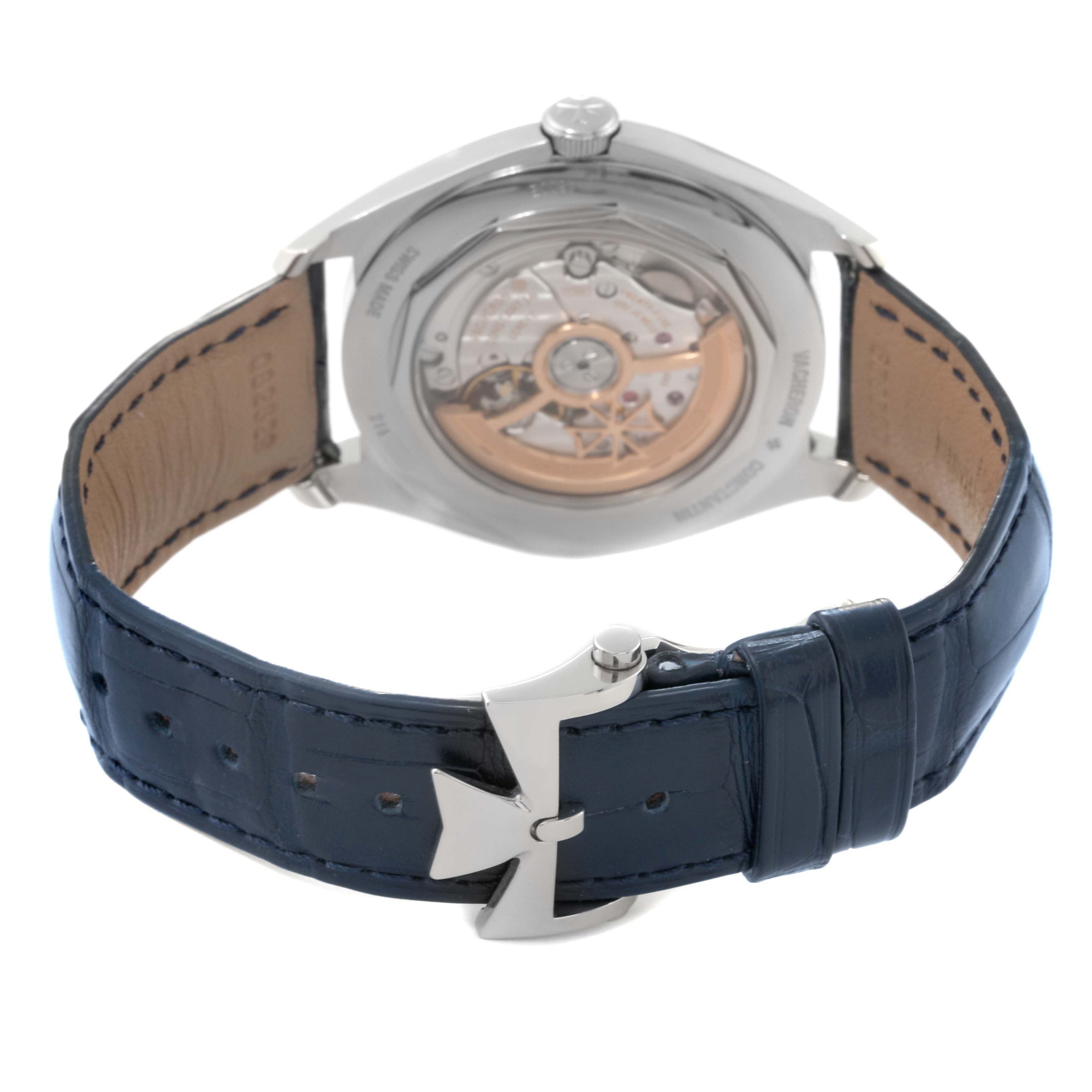 The image shows the back view of a Vacheron Constantin Fiftysix 4600E/000A-B487 Men's Stainless Steel Blue Dial 4600E/000A-B487 Men's Stainless Steel Blue Dial watch, highlighting its movement and blue leather strap.