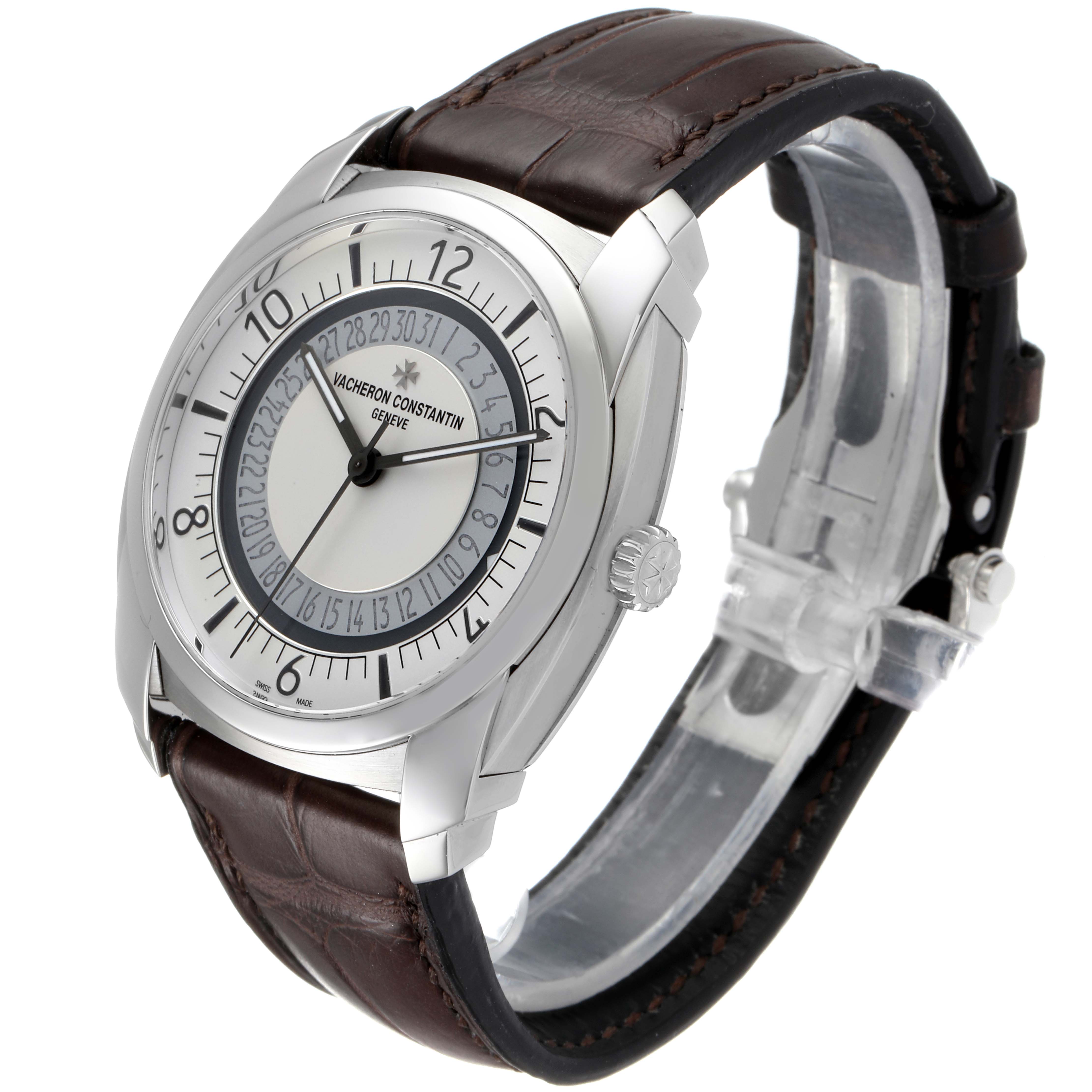 The watch is shown at a three-quarter angle displaying the face, bezel, crown, case, and brown leather strap of the Vacheron Constantin Quai de L'Ile model.