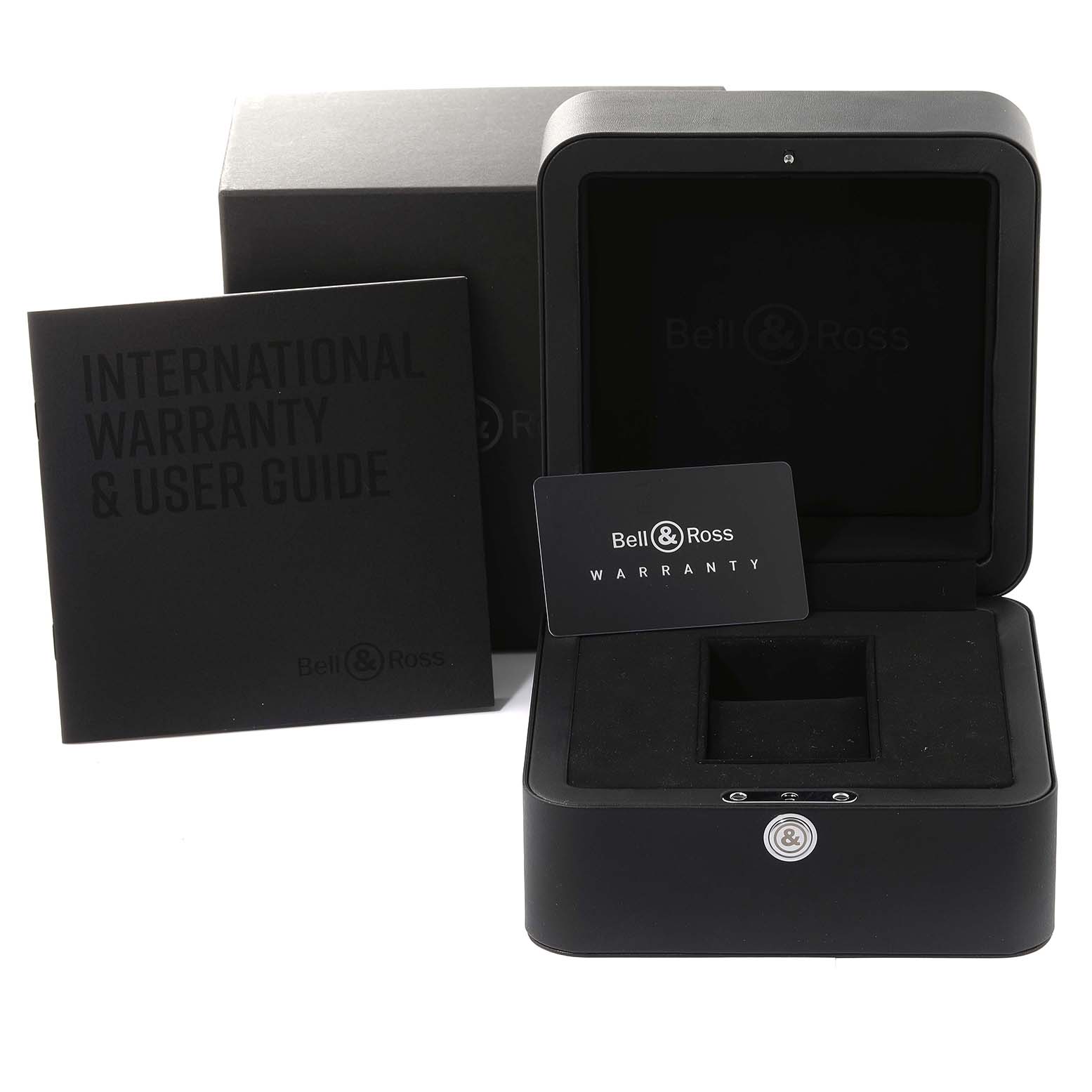 This image shows the packaging, warranty card, and user guide for the Bell 
Ross Chronograph watch.