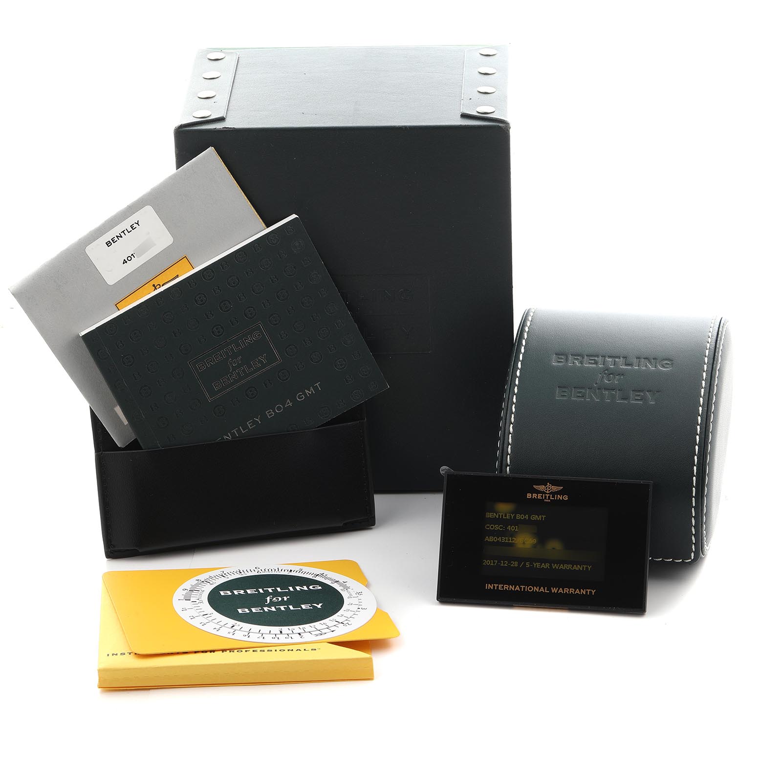 The image shows a Breitling for Bentley watch box, manuals, warranty card, and a storage case from a side angle.
