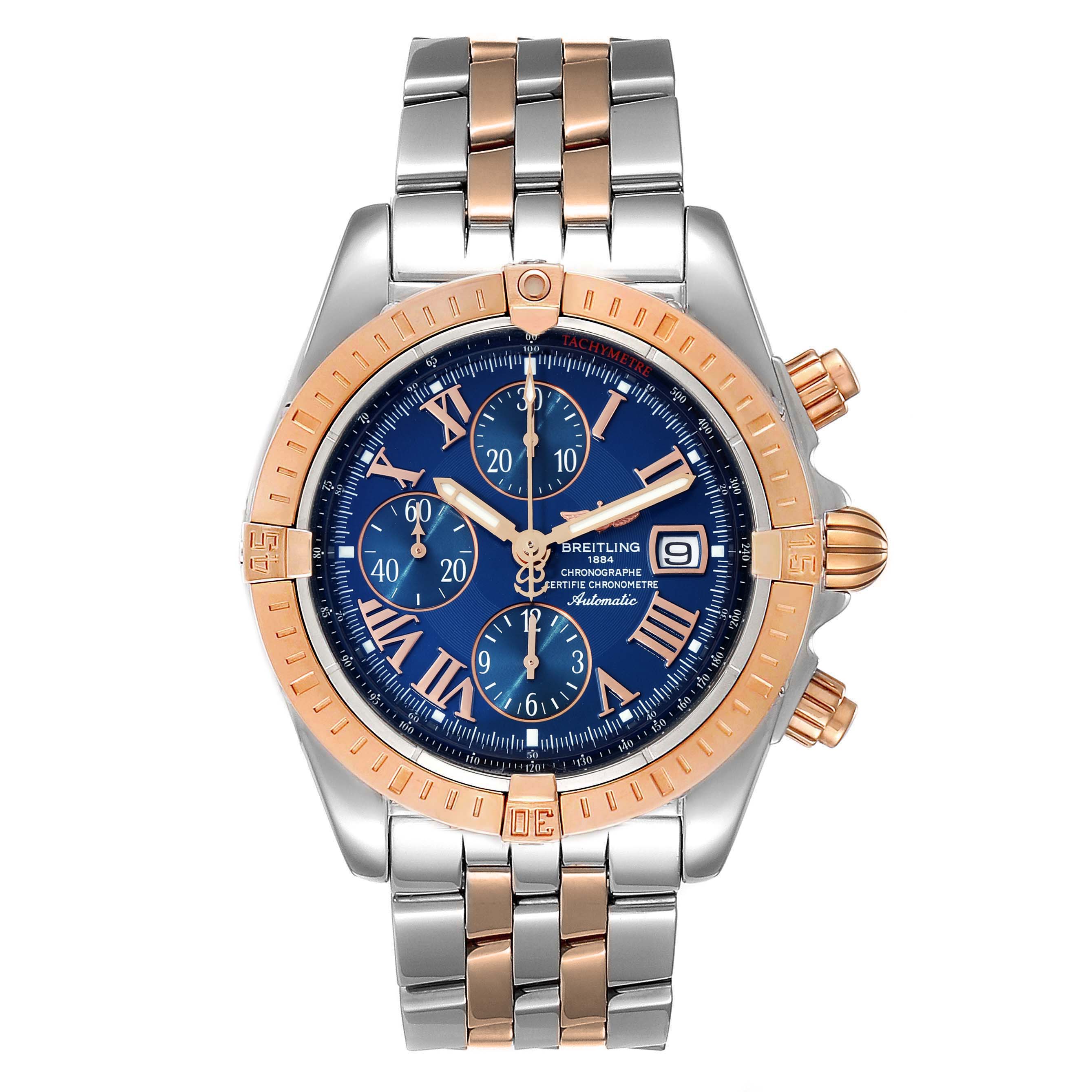 The image shows a front view of a Breitling Chronomat C13356 Men
s Steel and Gold (two tone) Blue Dial C13356 Men
s Steel and Gold (two tone) Blue Dial watch, displaying its dial, case, bezel, and bracelet.