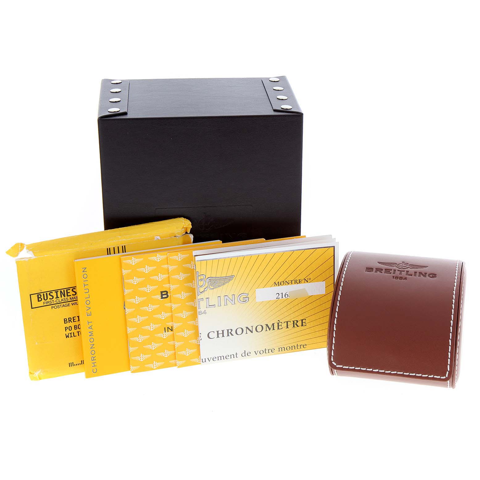 The image shows the packaging and accessories for a Breitling Chronomat C13356 Men
s Steel and Gold (two tone) Blue Dial C13356 Men
s Steel and Gold (two tone) Blue Dial watch, including a black box, manuals, and a brown leather case.