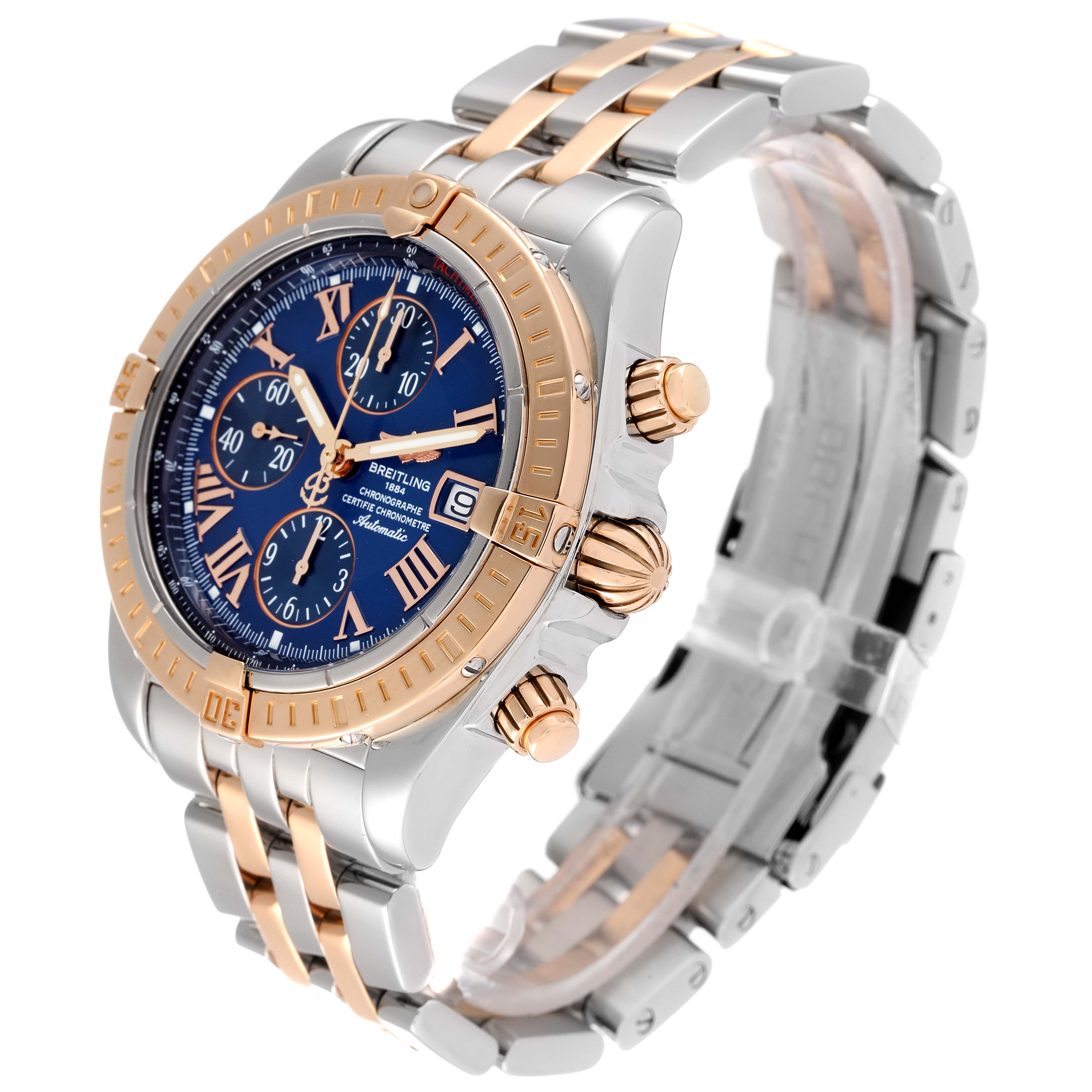 The Breitling Chronomat C13356 Men
s Steel and Gold (two tone) Blue Dial C13356 Men
s Steel and Gold (two tone) Blue Dial watch is shown at an angle highlighting its face, bezel, crown, and part of the bracelet.