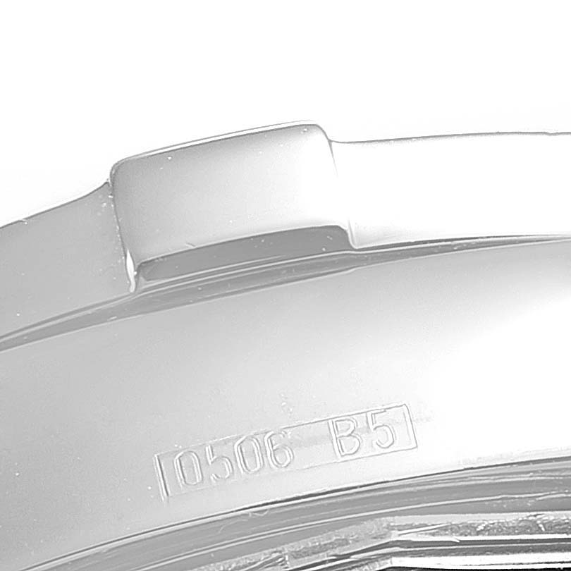 This image shows a close-up of the bezel and part of the case with markings on a Breitling Colt A32350 Men's Stainless Steel Black Dial A32350 Men's Stainless Steel Black Dial watch.