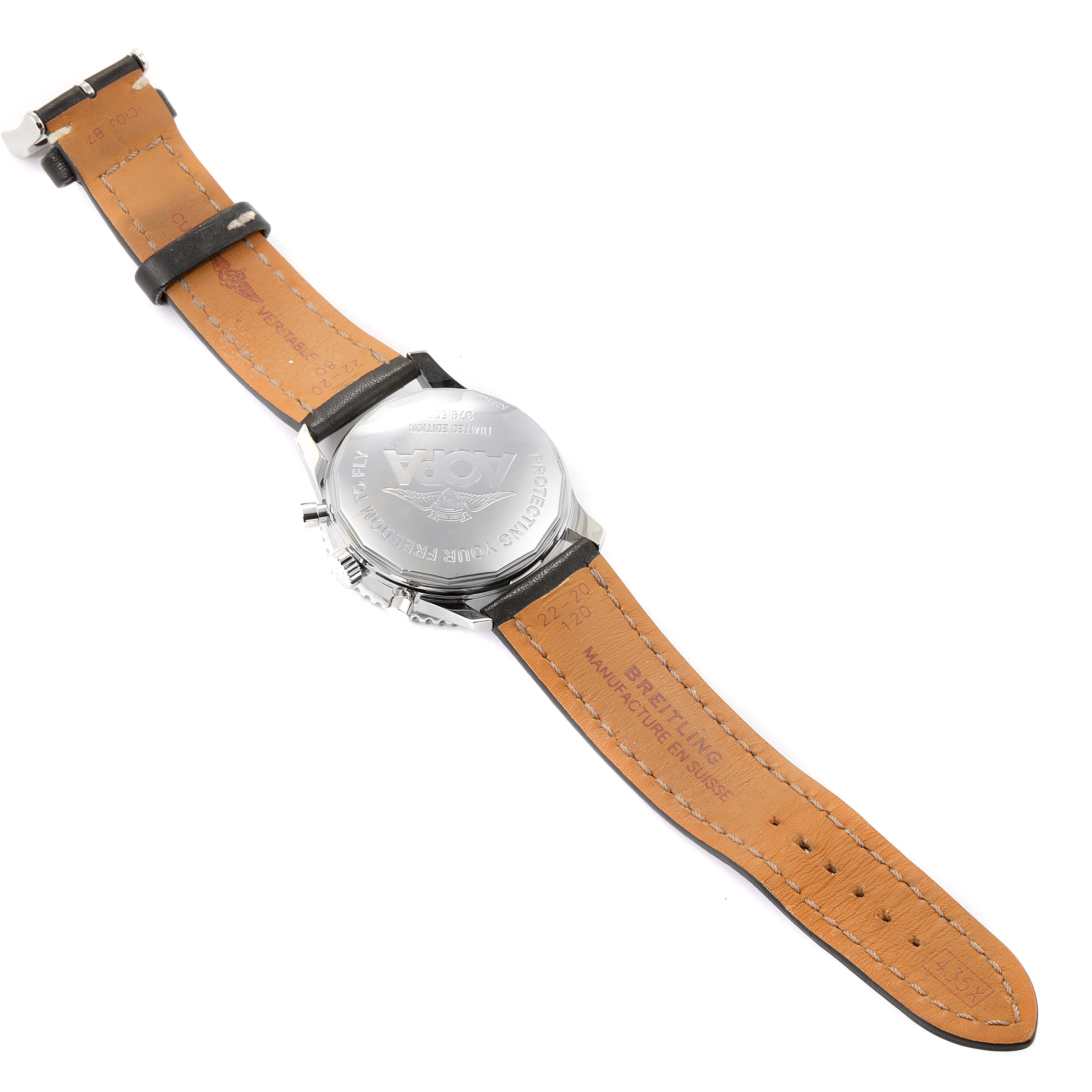 This image shows the back of a Breitling Navitimer A23322 Men's Stainless Steel Black Dial A23322 Men's Stainless Steel Black Dial watch, including the brown leather strap and the engraved case back.