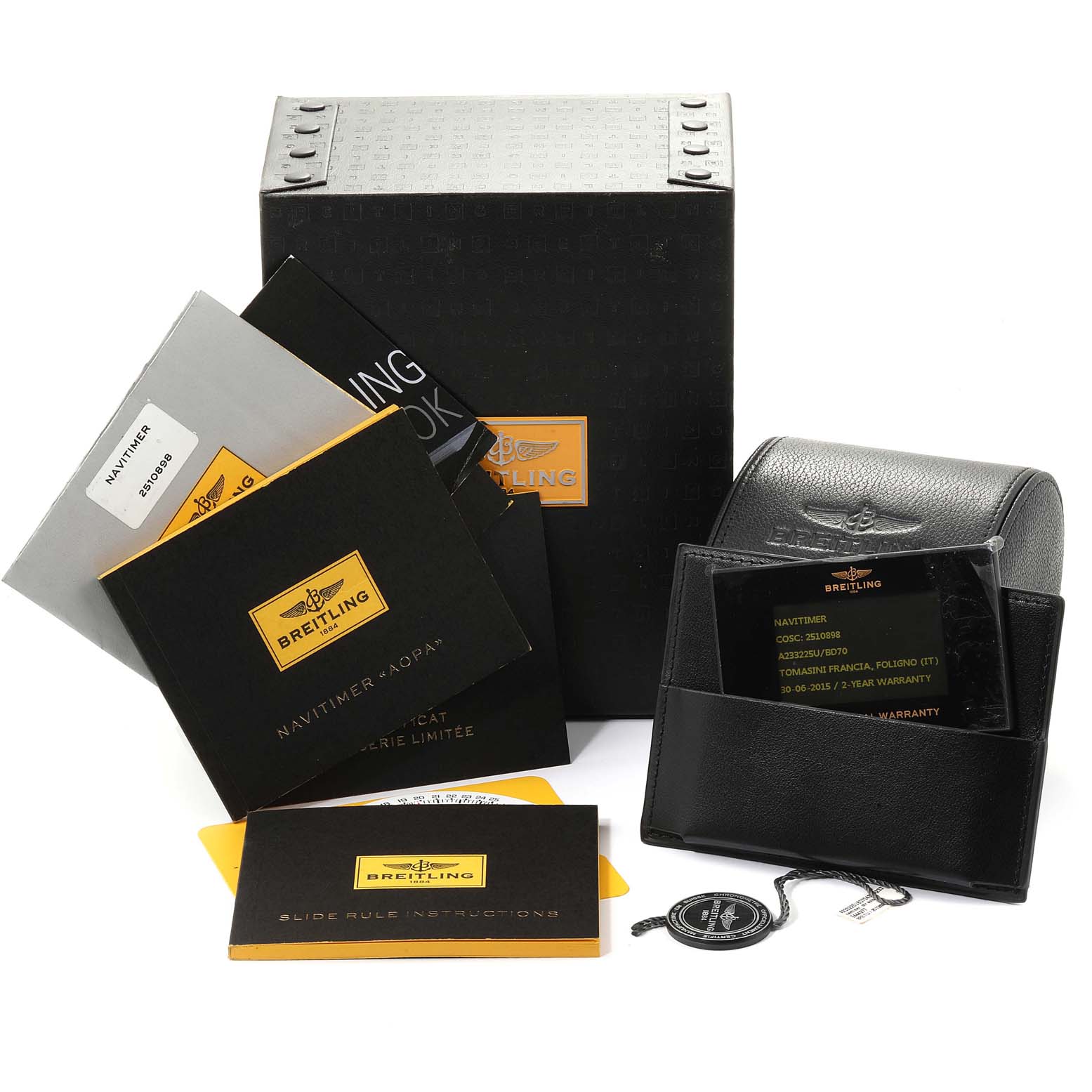 The image shows packaging and accessories for the Breitling Navitimer A23322 Men's Stainless Steel Black Dial A23322 Men's Stainless Steel Black Dial, including a box, manuals, warranty cards, and a tag.