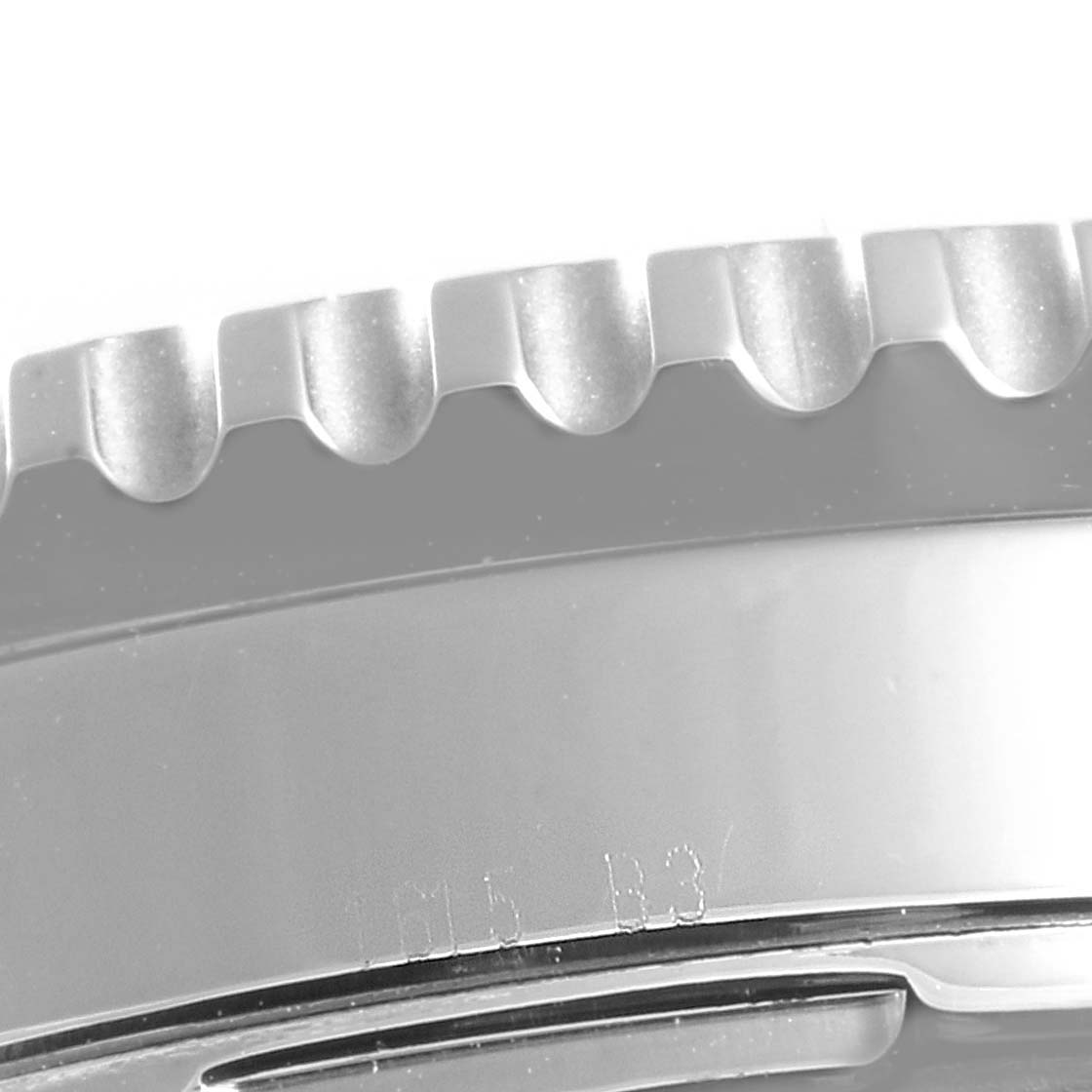 This is a close-up view of the bezel and part of the case of a Breitling Navitimer A23322 Men's Stainless Steel Black Dial A23322 Men's Stainless Steel Black Dial watch.