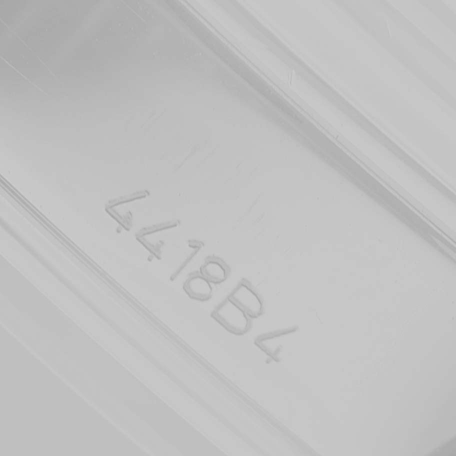 The image shows an engraved detail, possibly part of the Breitling Premier A13315 Men's Stainless Steel Blue Dial watch packaging or documentation.