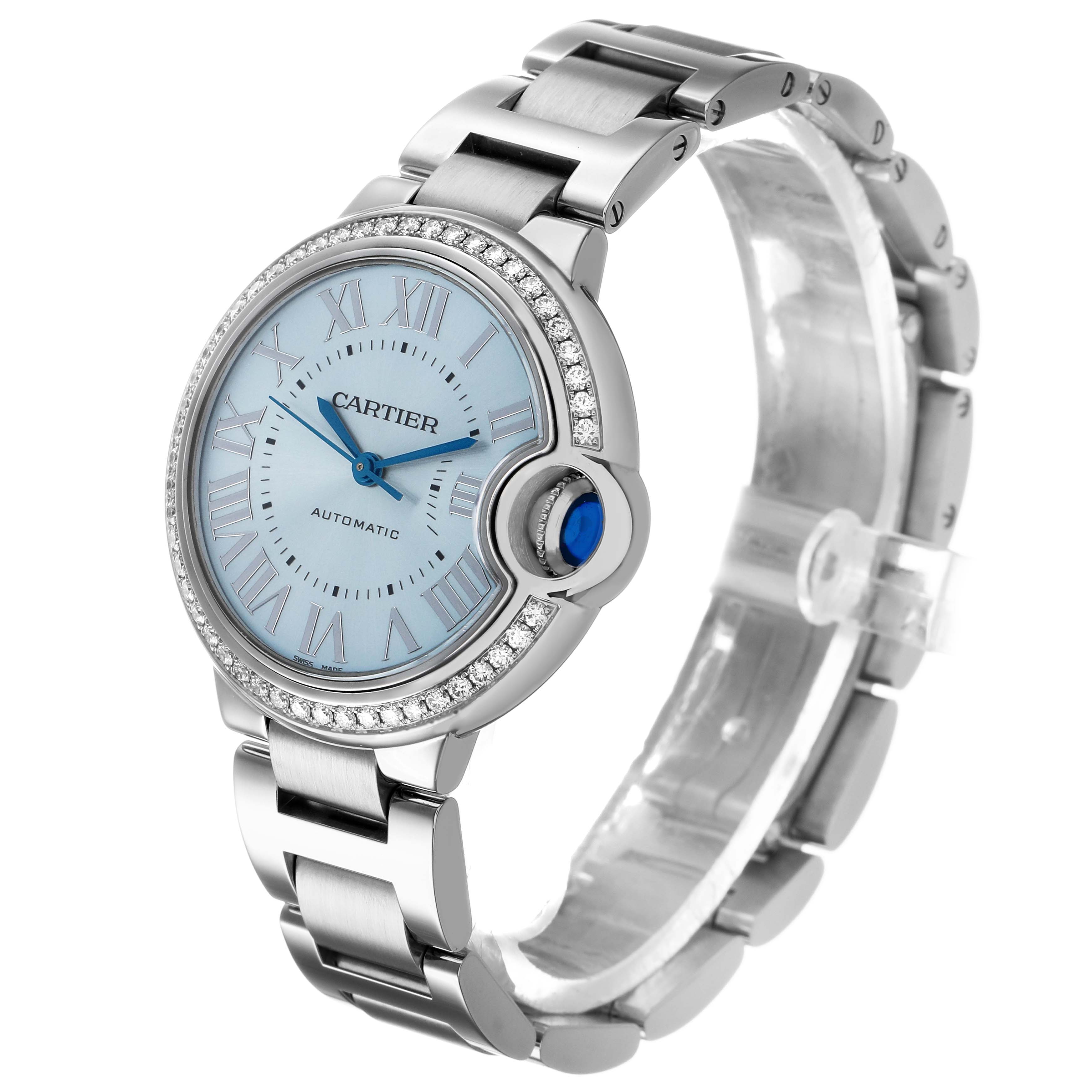 The Cartier Ballon Bleu W4BB0028 Women's Stainless Steel Blue Dial watch is shown at a three-quarter angle, highlighting the dial, bezel, and bracelet.