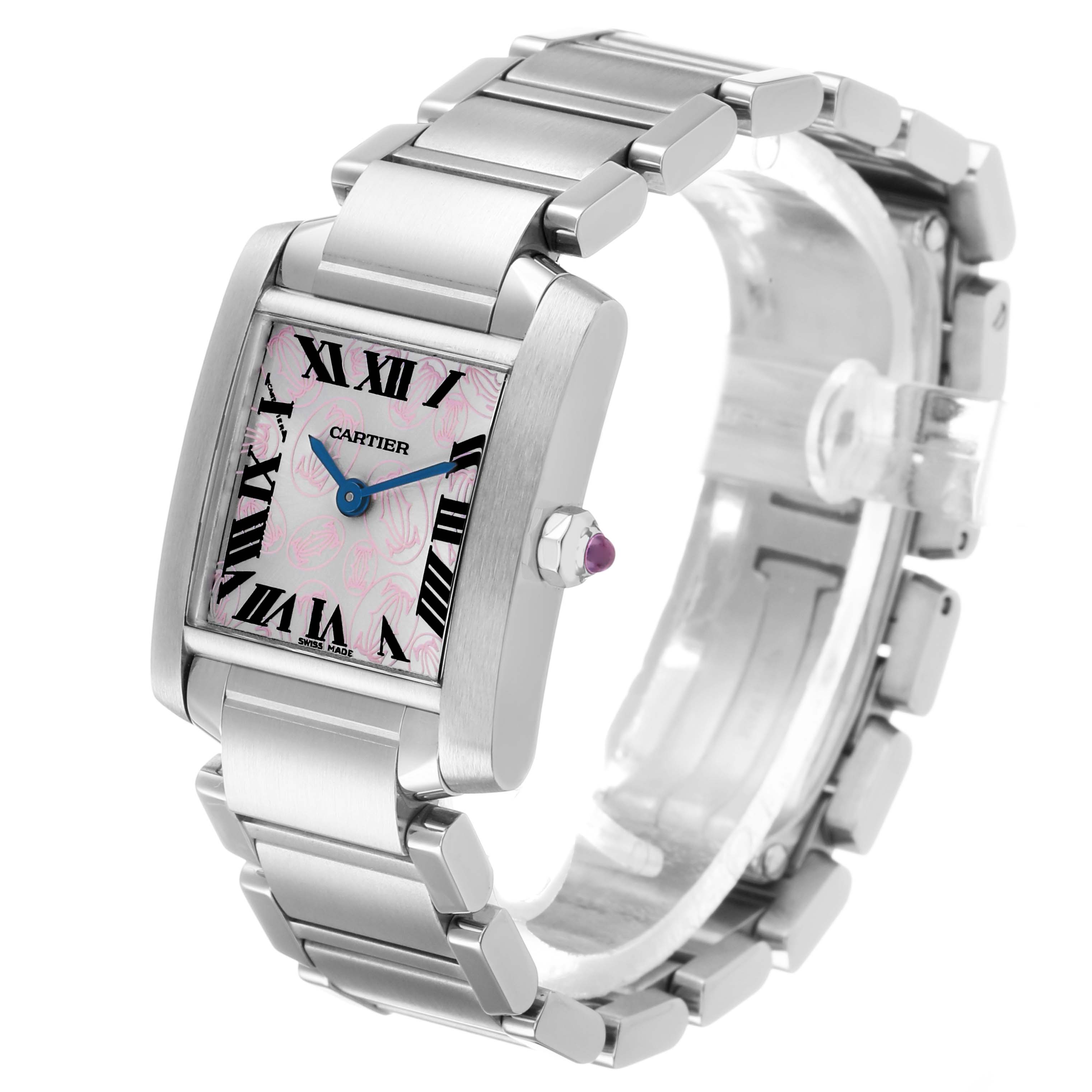 The Cartier Tank Française watch is shown at a three-quarter angle, highlighting its face, bracelet, and crown with a purple gemstone.