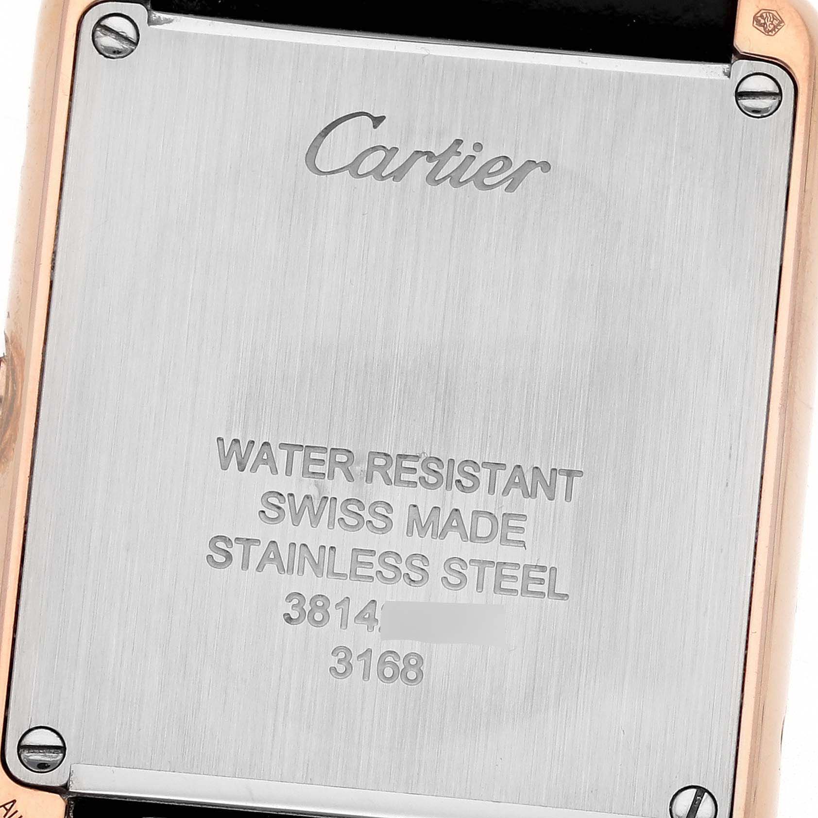 This is a close-up view of the back case of the Cartier Tank Solo W5200024 Women's Rose Gold Silver Dial W5200024 Women's Rose Gold Silver Dial watch, showing the brand's engraving and watch specifications.