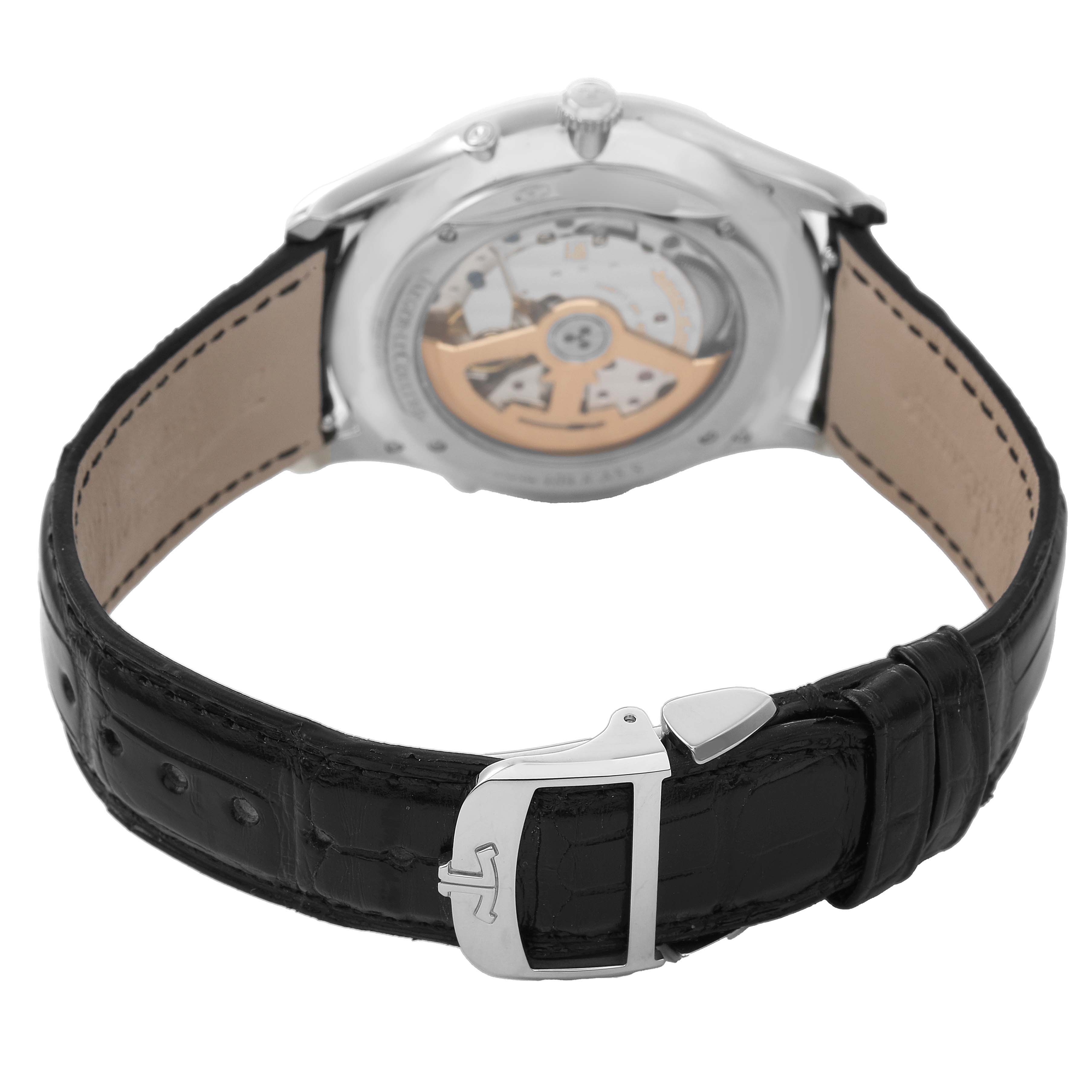 The image shows the back of a Jaeger-LeCoultre Master model watch, displaying the movement and leather strap with a buckle.