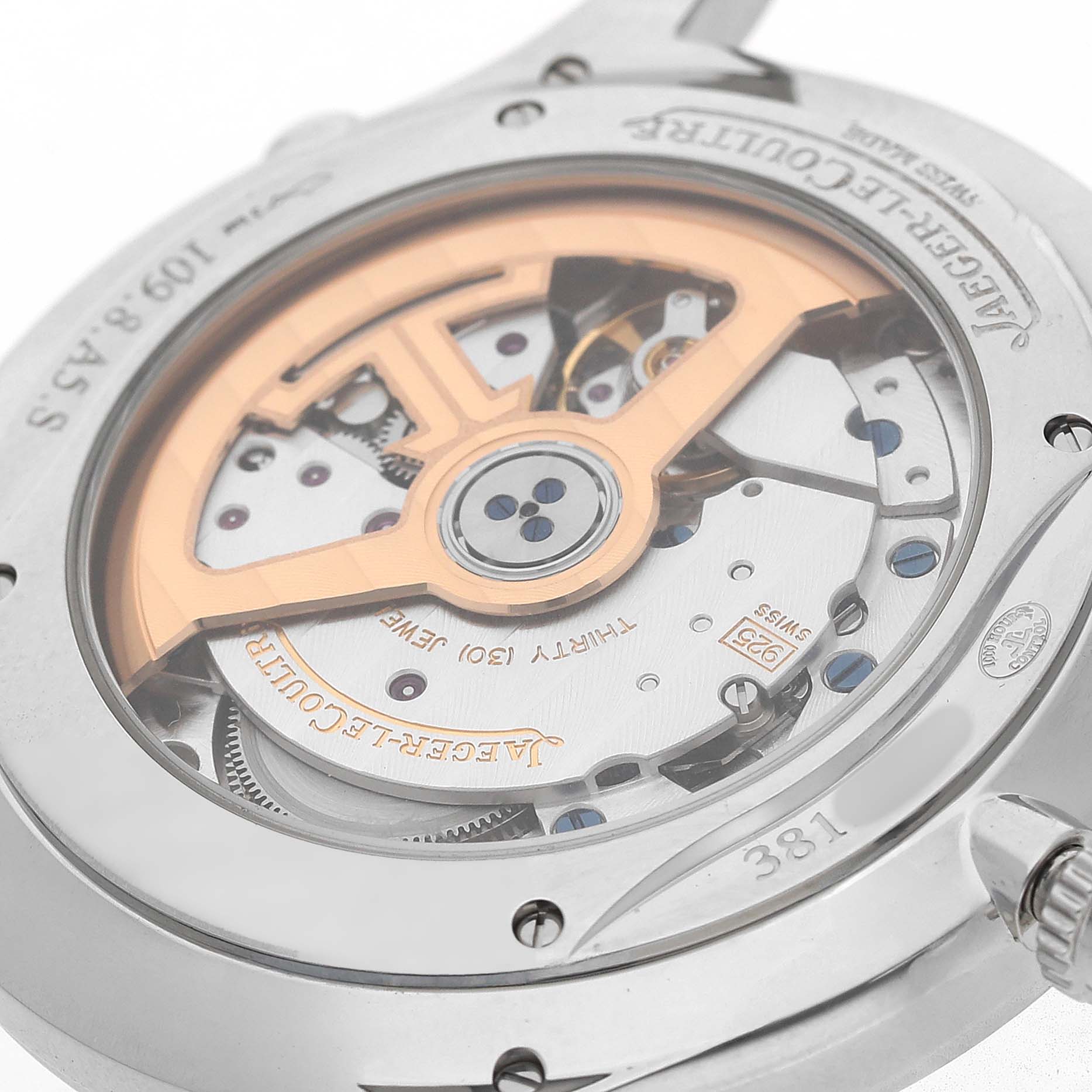 The image shows the back of a Jaeger-LeCoultre Master model, highlighting its movement and rotor through a transparent case back.