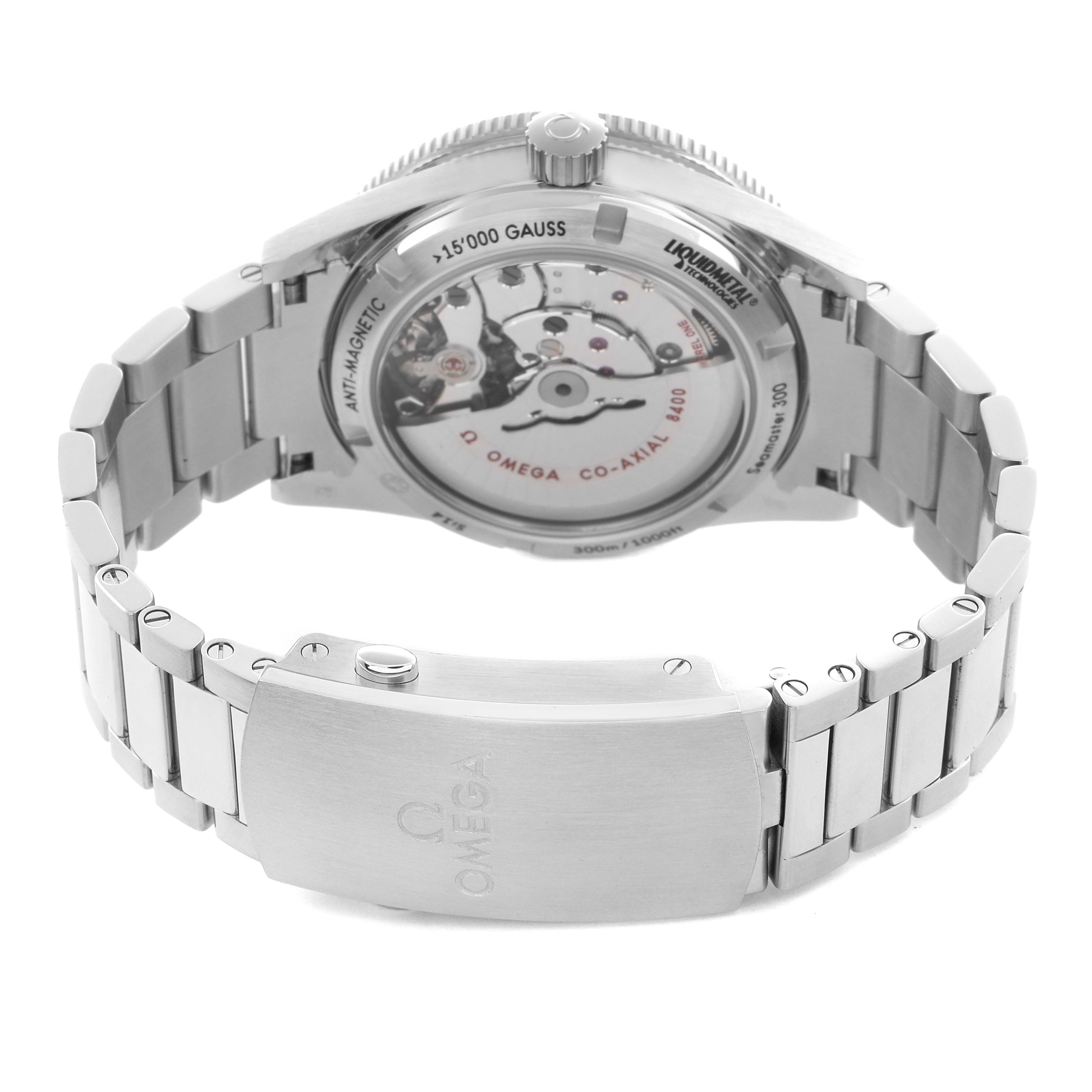 The Omega Seamaster Men
s Stainless Steel Black Dial Men
s Stainless Steel Black Dial watch is shown from the back, displaying the transparent case back and metal bracelet.