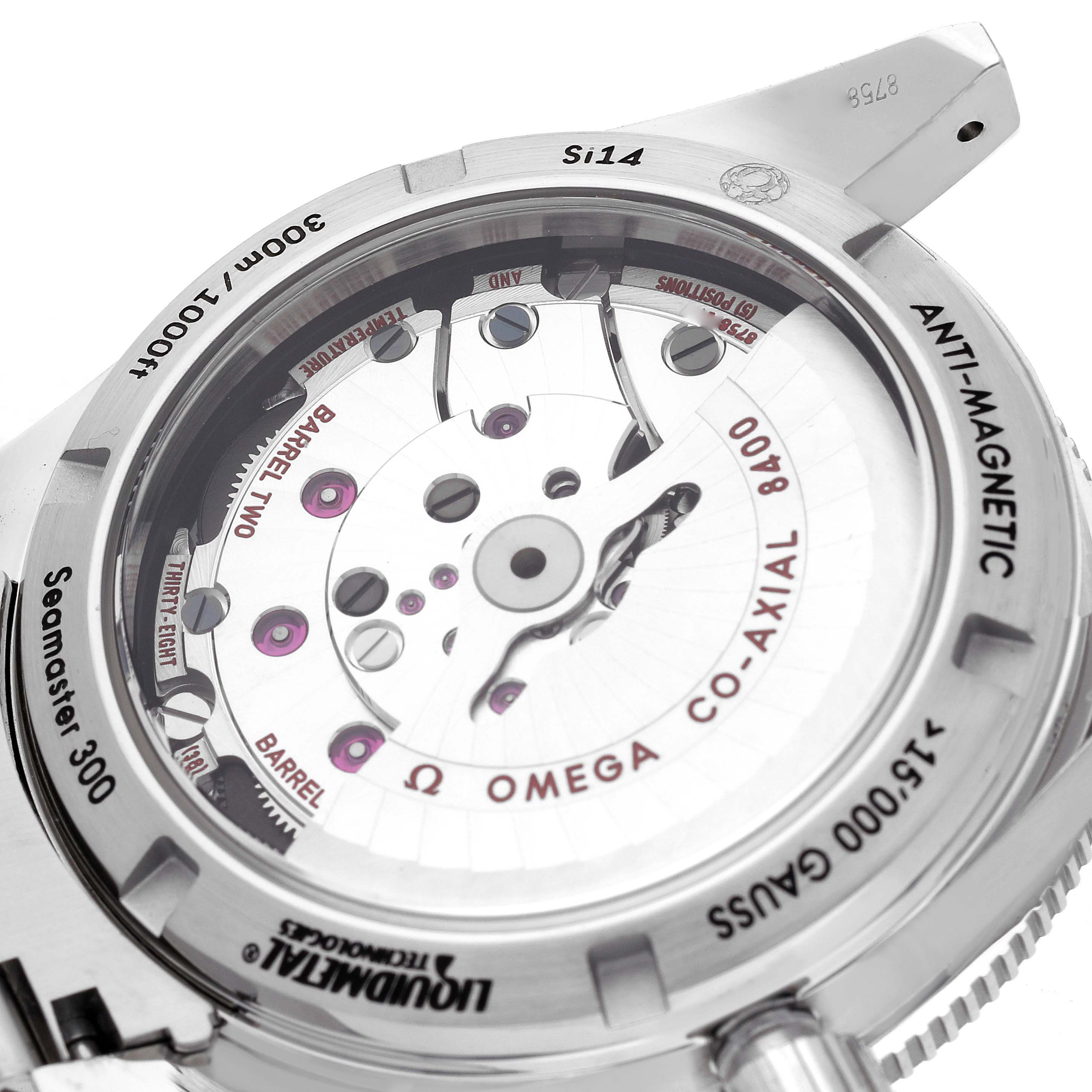 The image shows the back of the Omega Seamaster Men
s Stainless Steel Black Dial Men
s Stainless Steel Black Dial, highlighting the Co-Axial 8400 movement and anti-magnetic features.