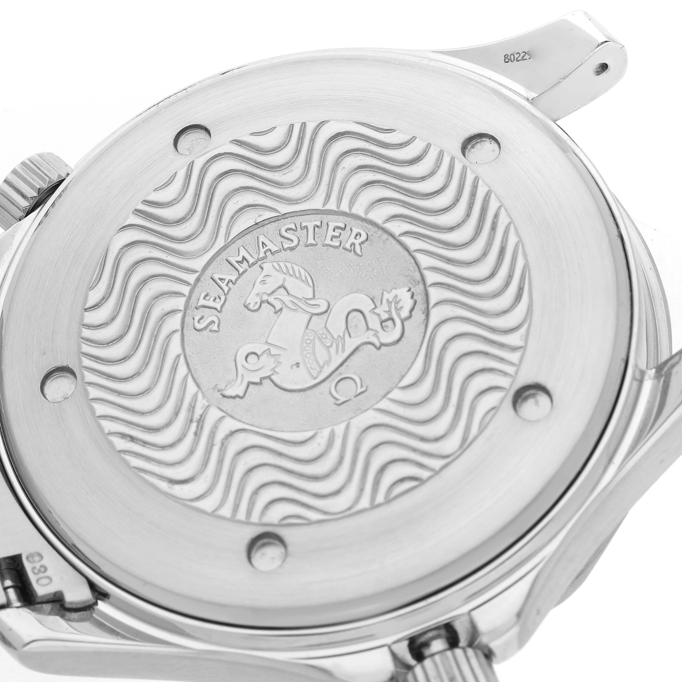 The image shows the case back of an Omega Seamaster 2255.80.00 Men
s Stainless Steel Blue Dial 2255.80.00 Men
s Stainless Steel Blue Dial watch with its engraved logo and wave pattern.