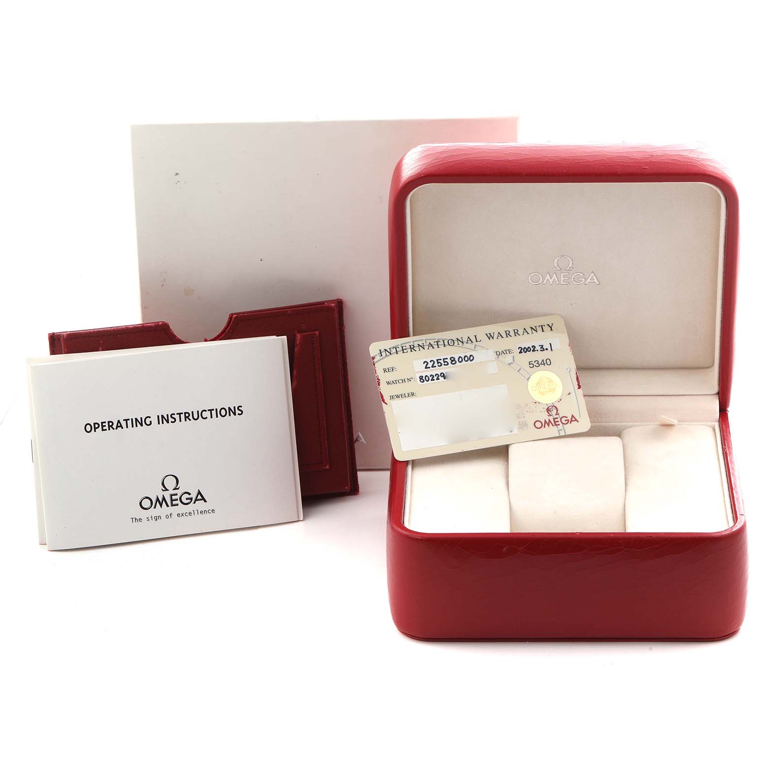 The image shows an Omega Seamaster 2255.80.00 Men
s Stainless Steel Blue Dial 2255.80.00 Men
s Stainless Steel Blue Dial watch box, operating instructions, and international warranty card from a front angle.