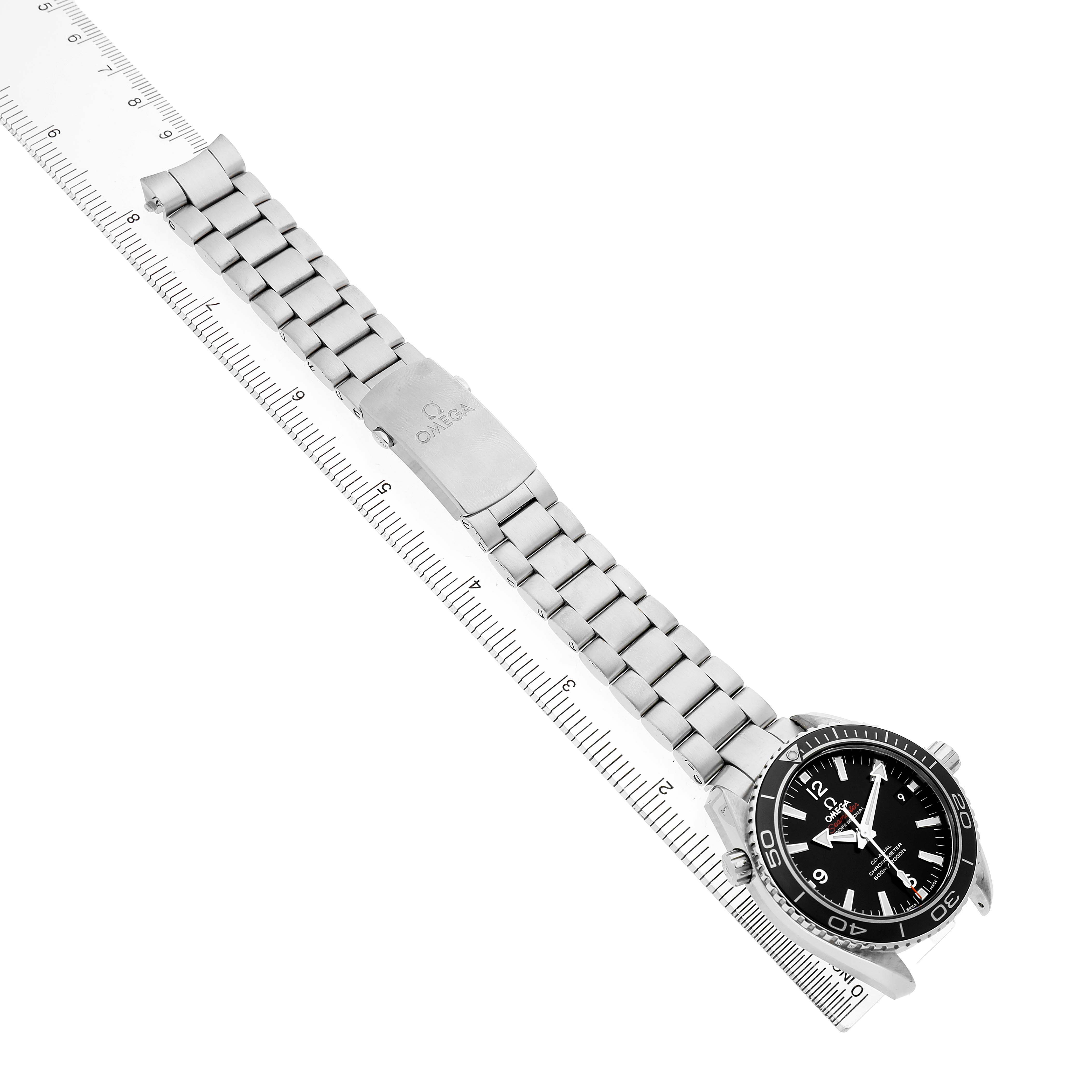 The Omega Planet Ocean 232.30.42.21.01.001 Men's Stainless Steel Black Dial watch is shown from an angled top view, displaying its face, bezel, bracelet, and clasp with logo.