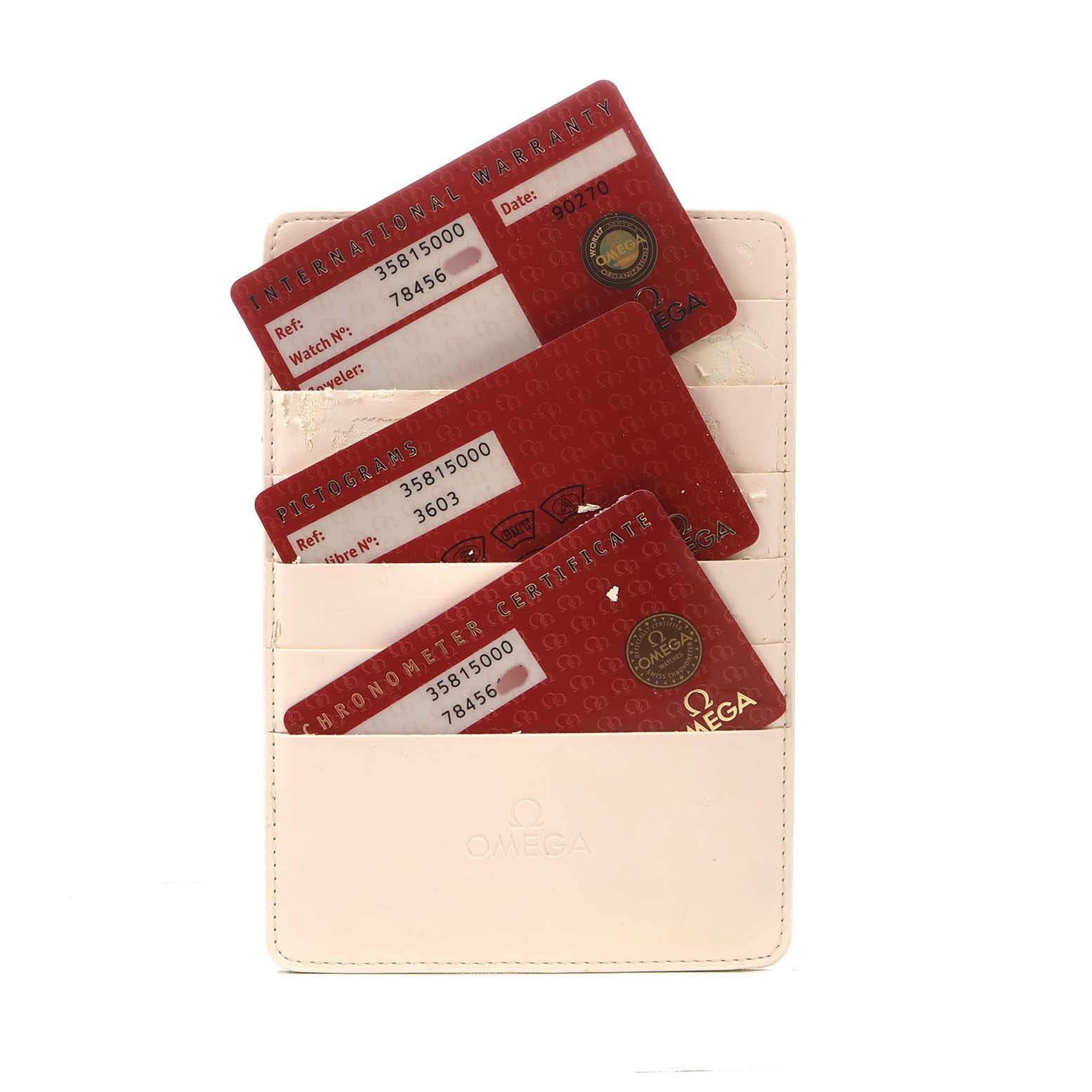The image shows Omega Speedmaster 3581.50.00 Men's Stainless Steel Black Dial's warranty cards and certifications in a cream cardholder, viewed from the front.