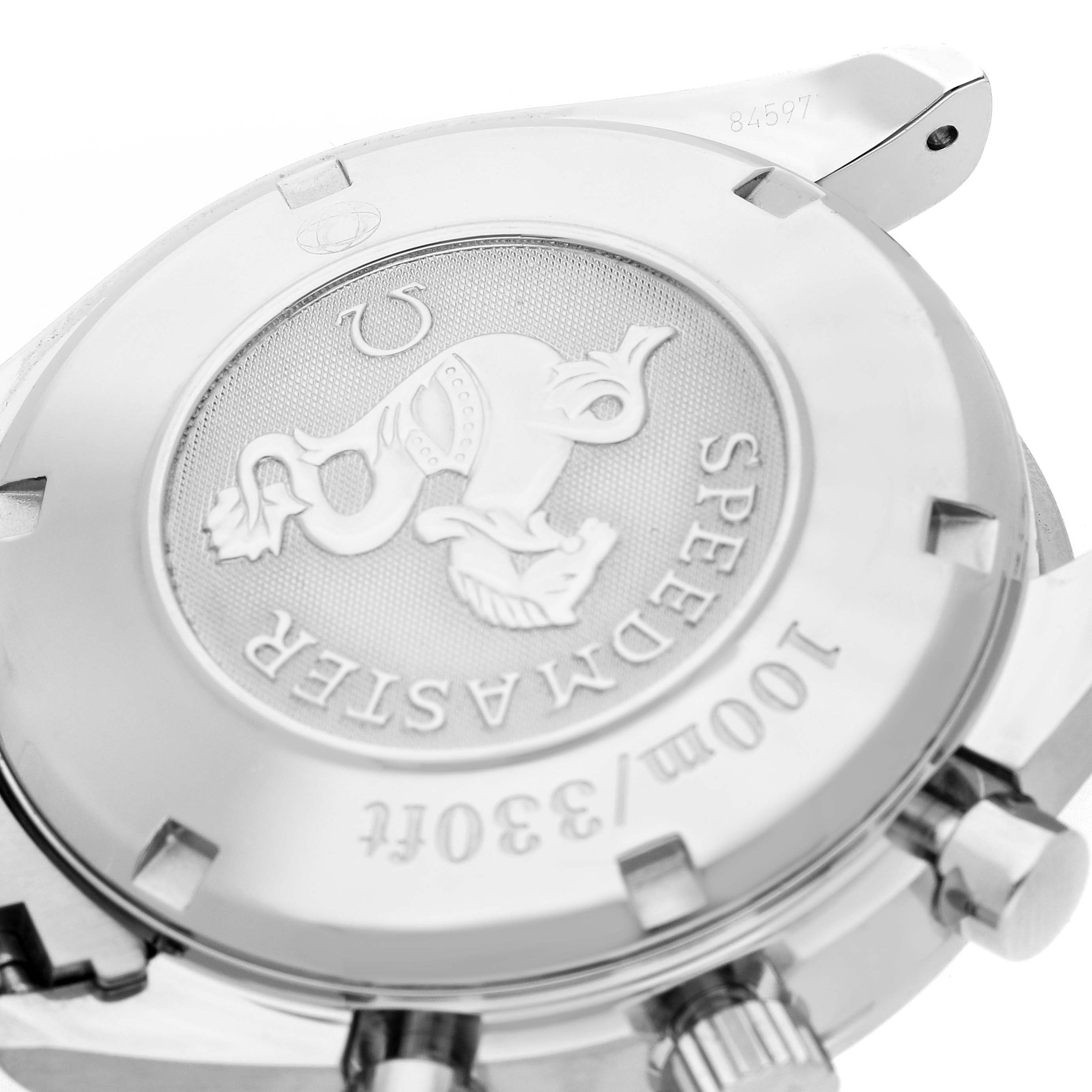 The image shows the back of the Omega Speedmaster 3222.80.00 Men
s Stainless Steel Blue Dial 3222.80.00 Men
s Stainless Steel Blue Dial watch, highlighting the engraved emblem and water resistance markings.