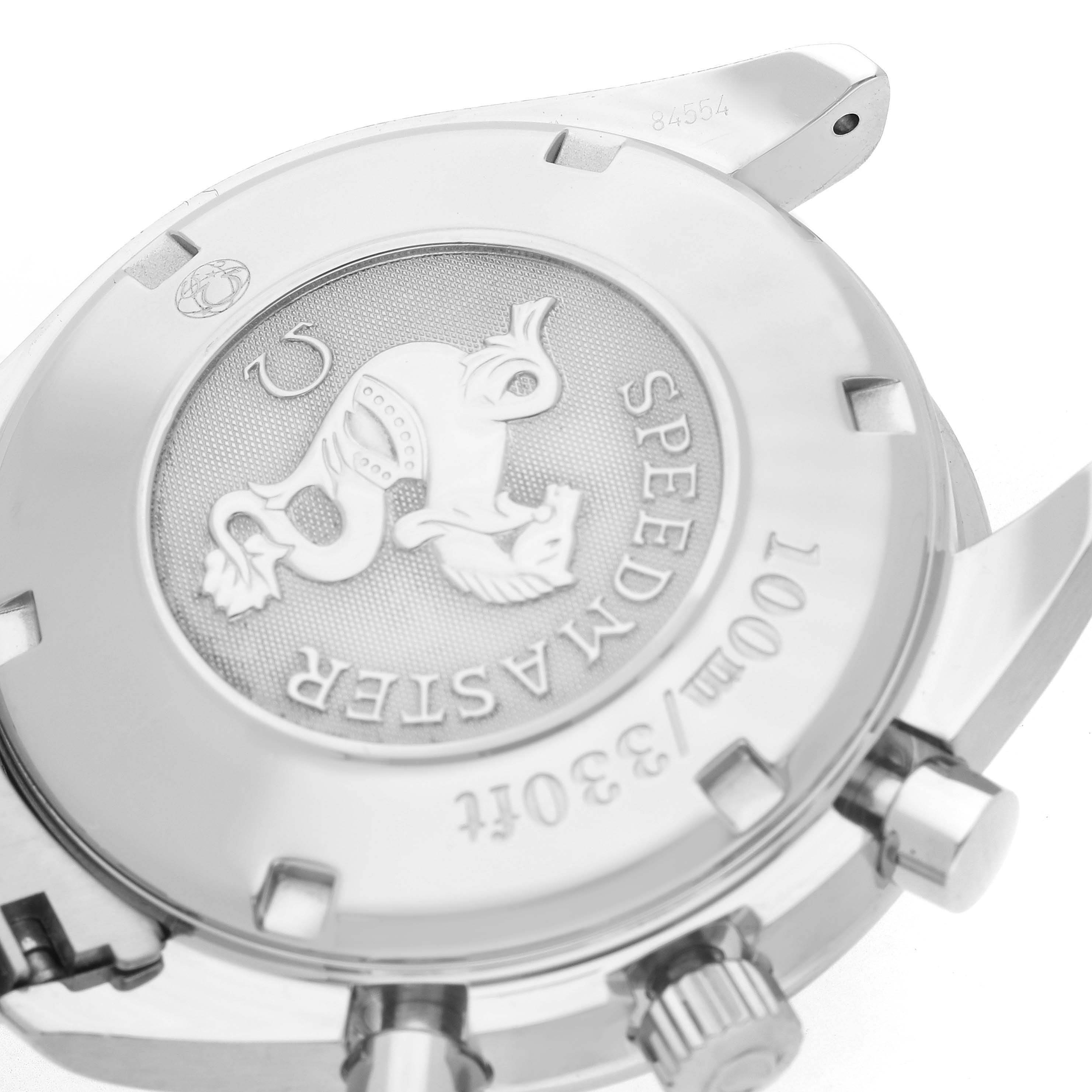 The image shows the case back of an Omega Speedmaster 3222.80.00 Men
s Stainless Steel Blue Dial 3222.80.00 Men
s Stainless Steel Blue Dial, highlighting its engraved design and chronological details.