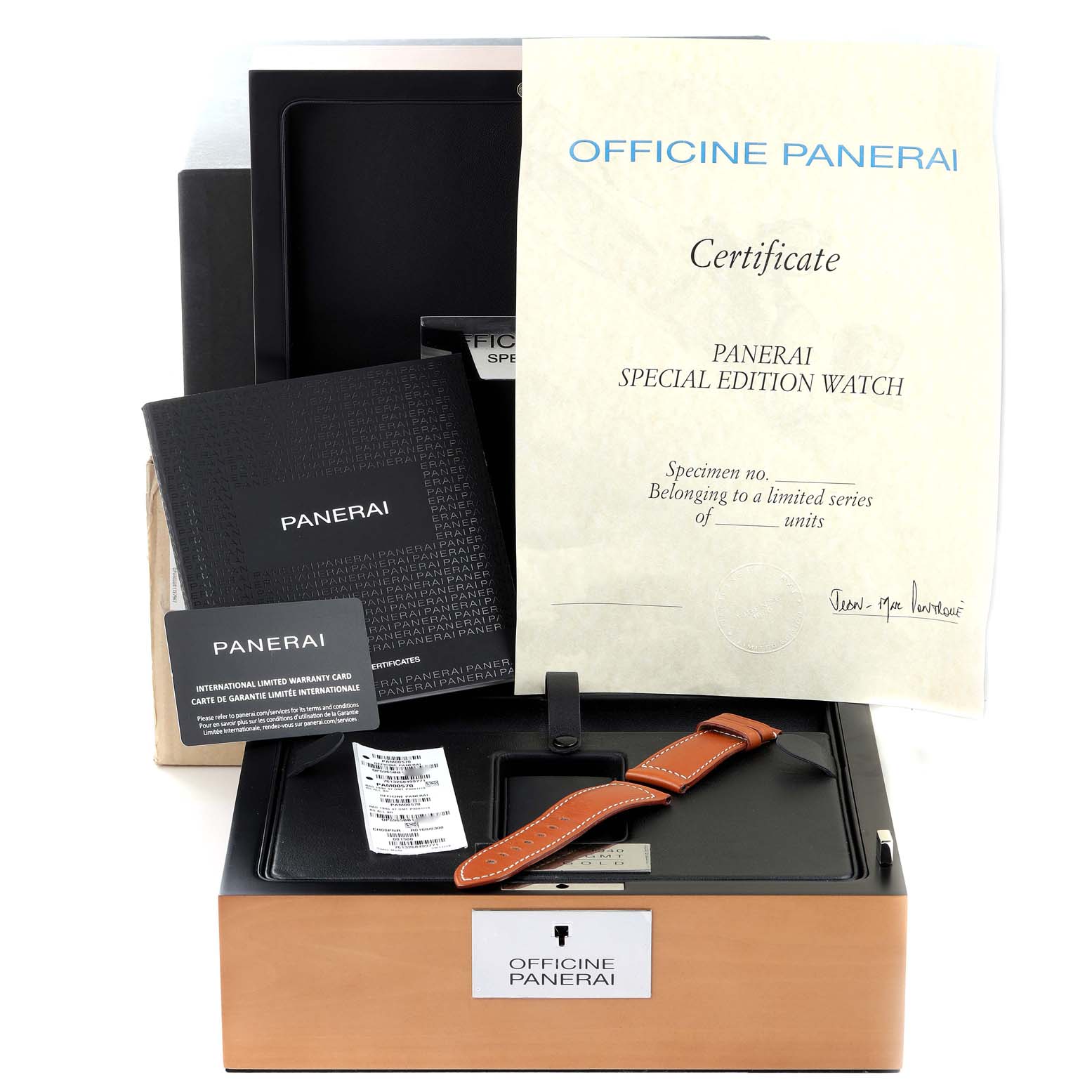 The image shows a Panerai Radiomir PAM00570 Men
s Rose Gold Brown Dial PAM00570 Men
s Rose Gold Brown Dial watch box set with certificates, a warranty card, and a watch strap from a top-down angle.